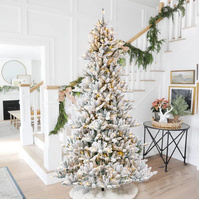 9ft Flocked Fir Artificial Christmas Tree with 650 Warm White Lights | Wayfair North America