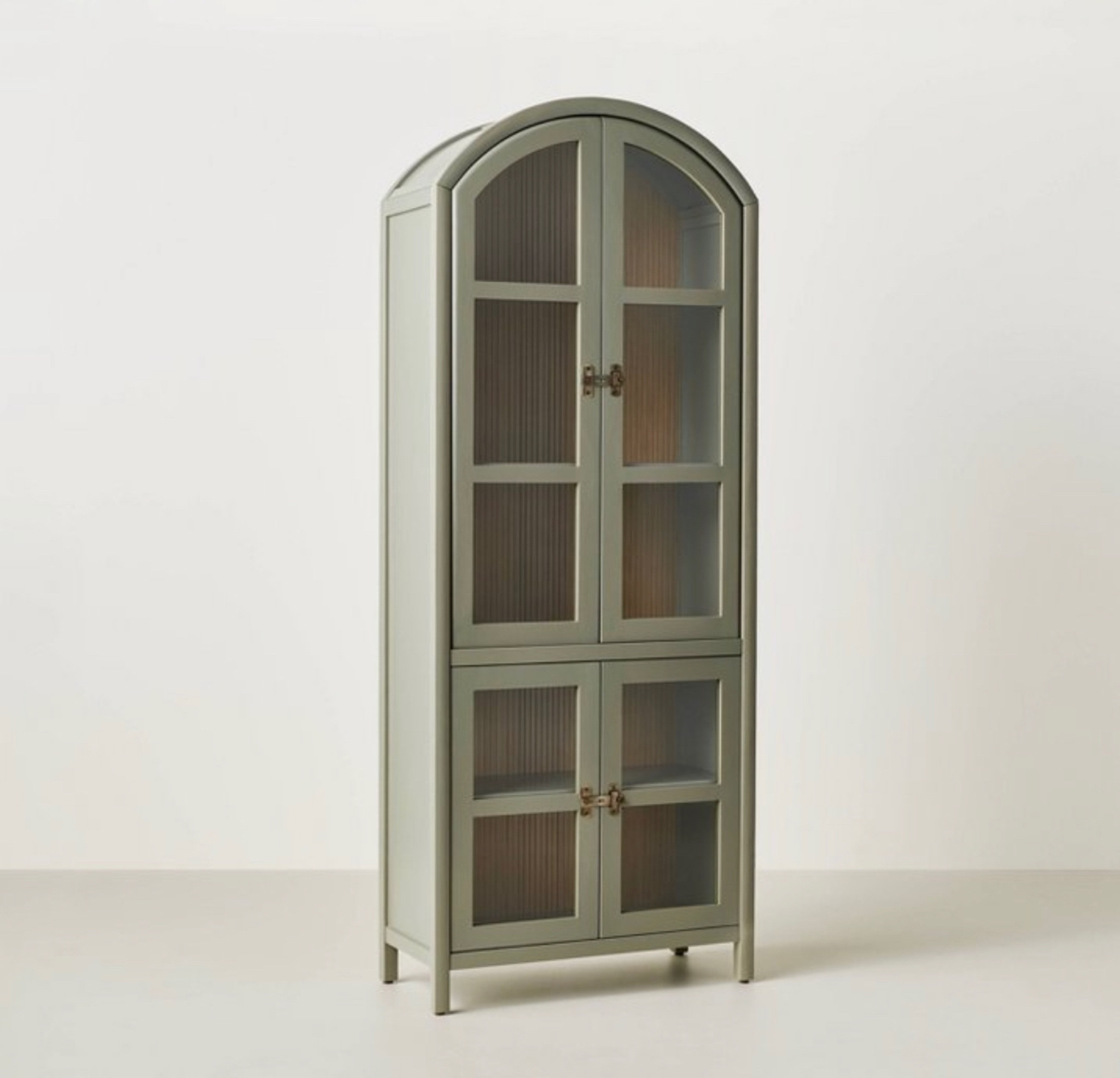 This is stunning and such a great price! Sage green arch cabinet. Gorgeous detail! 

#LTKHome