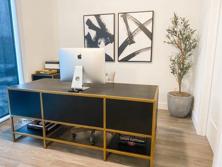 Home Office / Black & Gold Decor / Faux Olive Tree / Cement Planter / Framed Artwork / Home Decor / Office Desk / Coffee Table Books / Crate and Barrel Office Furniture / Executive Desk / Filing Cabinet / Abstract Wall Art 

#LTKhome