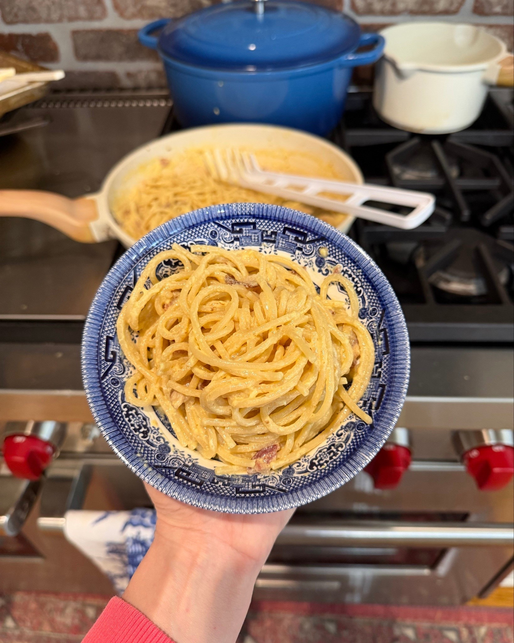 Cozy Date Night In 🍝 Easy Spaghetti Carbonara (No Cream!)

Nothing says cozy night at home like a big bowl of creamy spaghetti carbonara ✨ This version is simple, classic, and made without heavy cream — just eggs, Parmesan, crispy bacon, and perfectly cooked spaghetti. It feels fancy but comes together in under 30 minutes 🙌🏼

Here’s the exact recipe I made:

Easy Spaghetti Carbonara (8.5 oz Spaghetti Version)
Serves about 3–4

Ingredients:
• 8.5 oz spaghetti
• 4–5 slices bacon, chopped
• 2 large eggs
• ¾ cup freshly grated Parmesan
• ½ tsp black pepper
• Salt (for pasta water)

Instructions:
	1.	Bring a large pot of well-salted water to a boil. Cook spaghetti until al dente. Reserve about ¾ cup pasta water before draining.
	2.	While pasta cooks, cook bacon in a large skillet until crisp. Turn off heat but leave bacon and drippings in the pan.
	3.	In a bowl, whisk together eggs, Parmesan, and black pepper.
	4.	Add hot drained pasta to the skillet with bacon (off heat). Toss. Slowly pour in the egg mixture while tossing quickly so it becomes creamy and glossy (not scrambled).
	5.	Add a splash of reserved pasta water at a time until the sauce is silky and coats the pasta.
	6.	Serve immediately with extra Parmesan and black pepper on top.

So simple, so creamy, and such a cozy dinner idea for busy weeknights or an easy at-home date night 🤍

easy dinner recipe, pasta night, spaghetti carbonara, bacon pasta recipe, quick family dinner, 30 minute meal, cozy dinner idea

#LTKHome #LTKfoodie #LTKmomlife