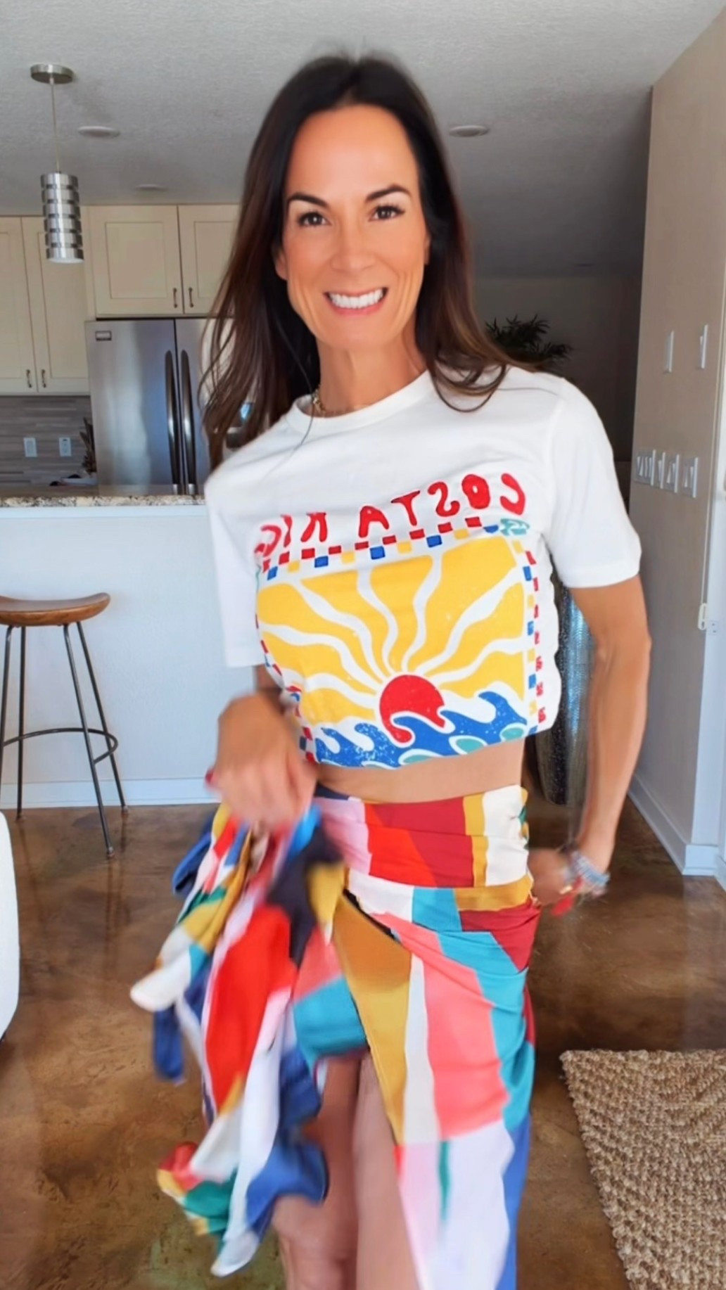 Color therapy but make it fashion 🌈✨
This silky wrap skirt + casual tee combo is giving “vacation energy with zero effort” and honestly… I’m obsessed. The bold colors, the flowy fit, the easy vibe — this is the kind of outfit that instantly puts me in a good mood 💃☀️

Proof that a simple tee and a statement skirt can absolutely steal the show. Paired it with oversized sunnies and a straw tote for the ultimate chic-but-fun summer look 🤍

And use code NICOLECOLEE35 for 35% off your order!

#ColorfulStyle #VacationStyle #SummerOOTD #ChicCasualStyle #NicoleColeeStyle

#LTKootd #LTKgrwm #LTKdayinmylife