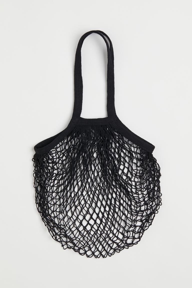 Conscious choice  New ArrivalPractical mesh tote in cotton. Long handles to carry easily over sho... | H&M (US)