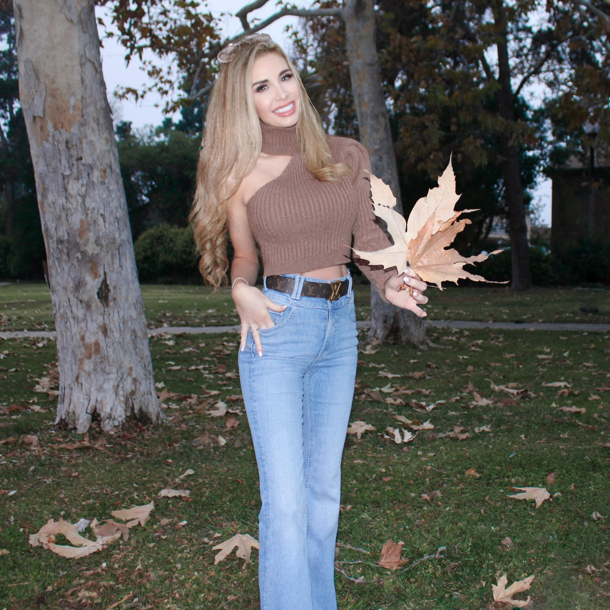 I'm giving you the cold shoulder and arm today. 😉 Not only that, my leaves just might be bigger than your leaves. 😃🍁 This brown chunky rubbed cropped turtleneck sweater is now marked down to $8.50 and looks great with high waisted flared jeans like these babies I got from #forever21 for just $34.99.  My Madden Girl Square toe "Autumn" Platform Booties are marked down to $69 and can be found at #DSW 

#LTKstyletip #LTKshoecrush #LTKsalealert