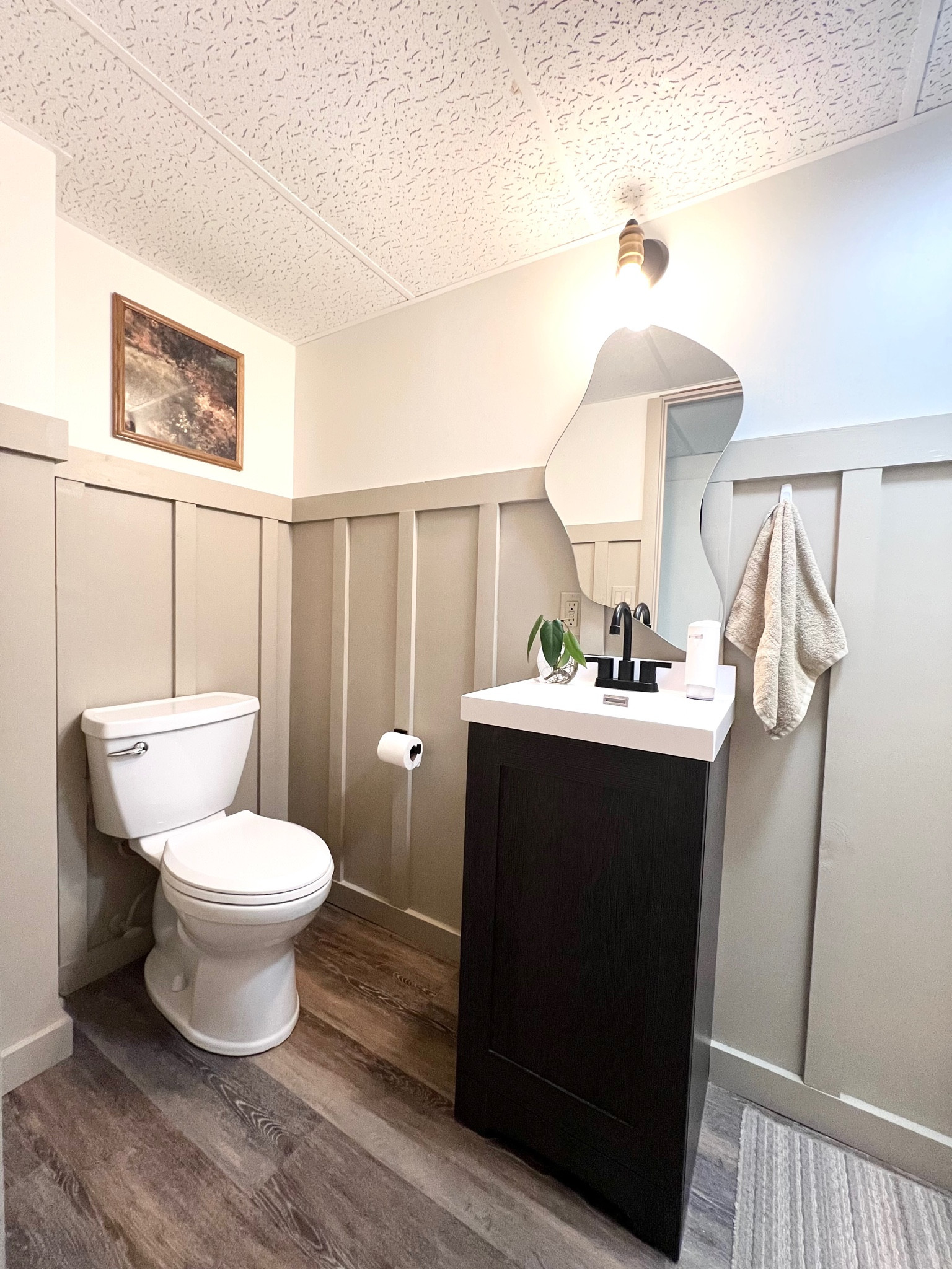 When we renovated our basement bathroom I needed to find a light fixture that would compliment the fun mirror and overall style of the bathroom. This one fit the bill! I removed the glass and it gave a fun look to the light fixture and the completed the bathroom. 

#LTKhome #LTKsalealert #LTKfamily