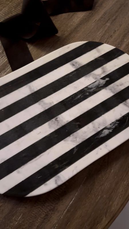 You will not believe the price on this gorgeous (and heavy!) black and white marble stripped tray! It’s such a beauty for under $30 and can be used as a cutting board, charcuterie board, or in your kitchen as decor. Set it by your stove to display your favorite oils, salts, and cooking utensils. Or display it on a coffee table with a candle, matches, and a wick trimmer. So many uses and it makes a great gift too… black and white will always be a classic!!! 

#LTKHome #LTKFindsUnder50 #LTKStyleTip