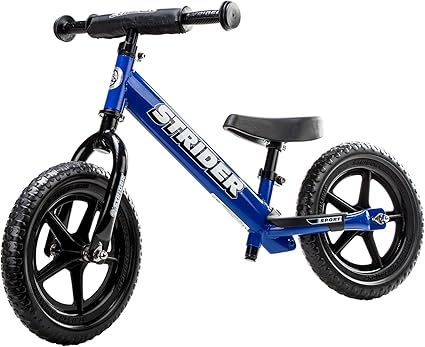 Strider - 12 Sport Kids Balance Bike, No Pedal Training Bicycle, Lightweight Frame, Flat-Free Tir... | Amazon (US)