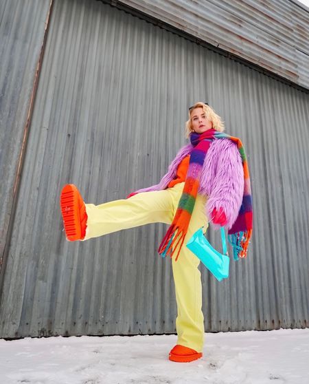 Colorful winter street style outfit inspo. Fluffy lilac coat, with orange details and colorful scarf. 

#LTKSeasonal #LTKstyletip #LTKeurope