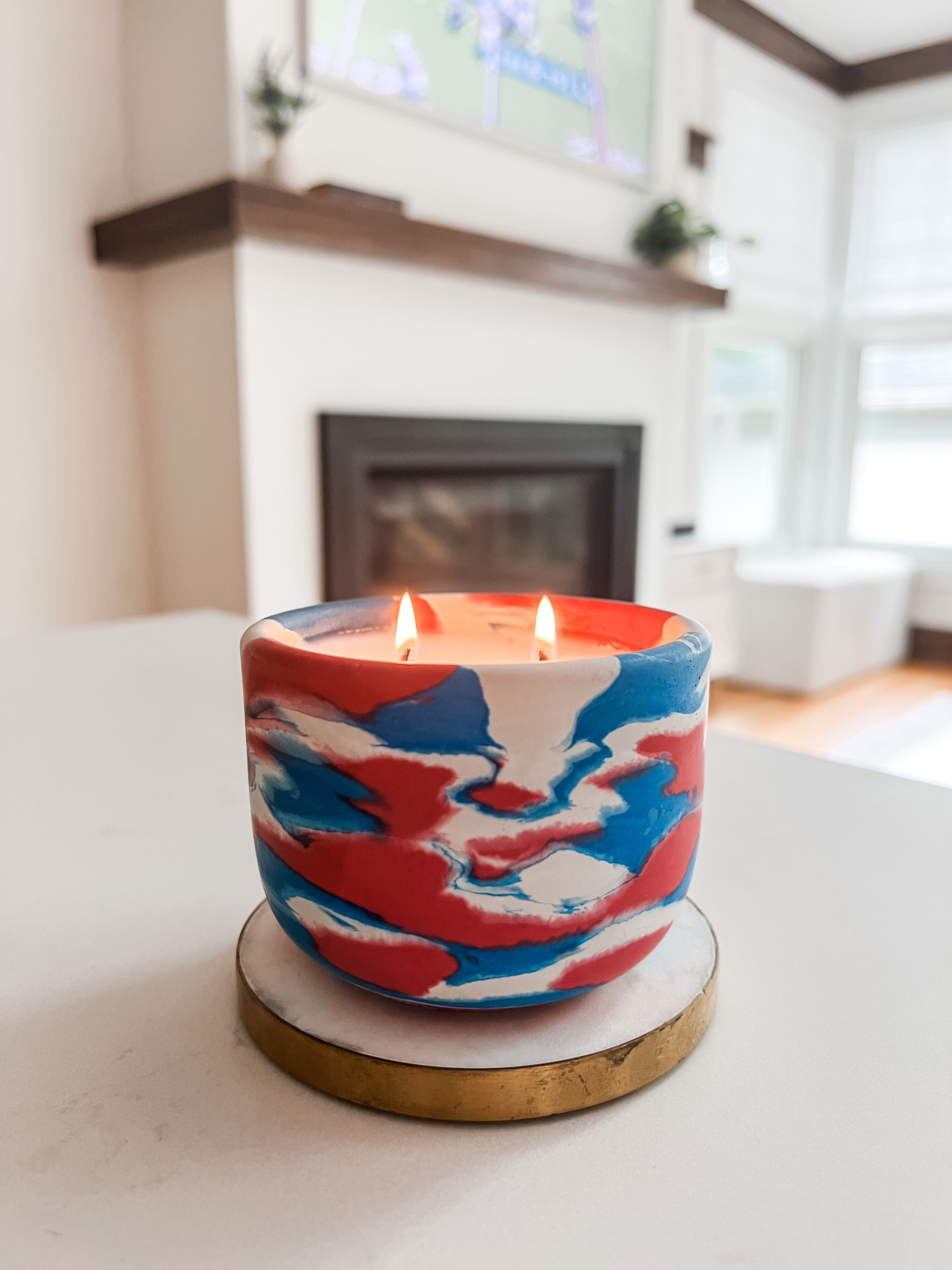 I always have a candle lit and bought a couple new ones for fall & football season. Fun way to show off your team’s colors! #letsgobuffalo

This one featured here is made by a local artist @rinartbynature, smells of sage/orange/oak moss - but linking to a few others!

#LTKSeasonal #LTKhome #LTKFind
