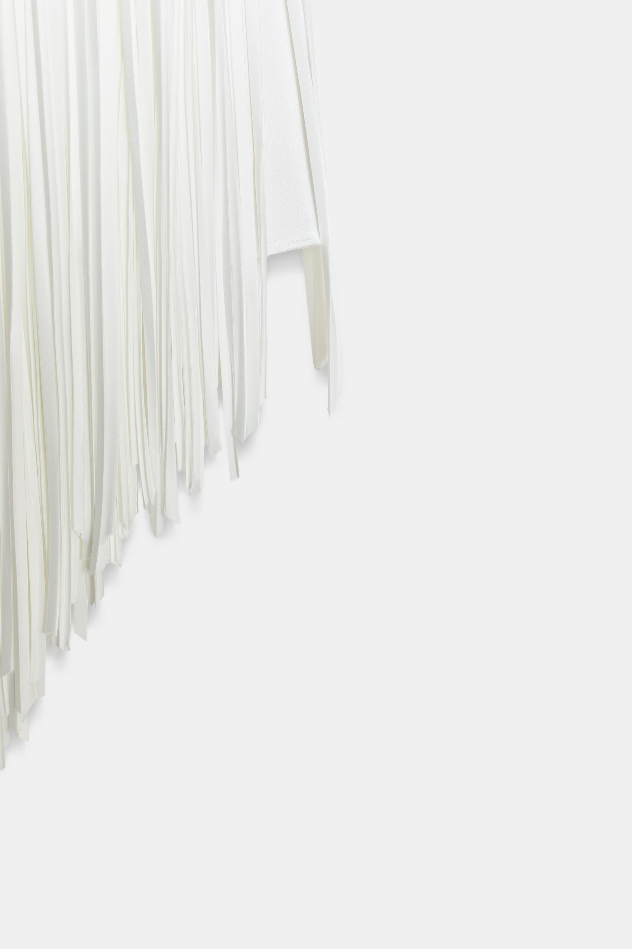 ZARA WOMAN COLLECTIONMid-rise midi skirt with fringe detail. Short interior lining. Hidden in-sea... | Zara US