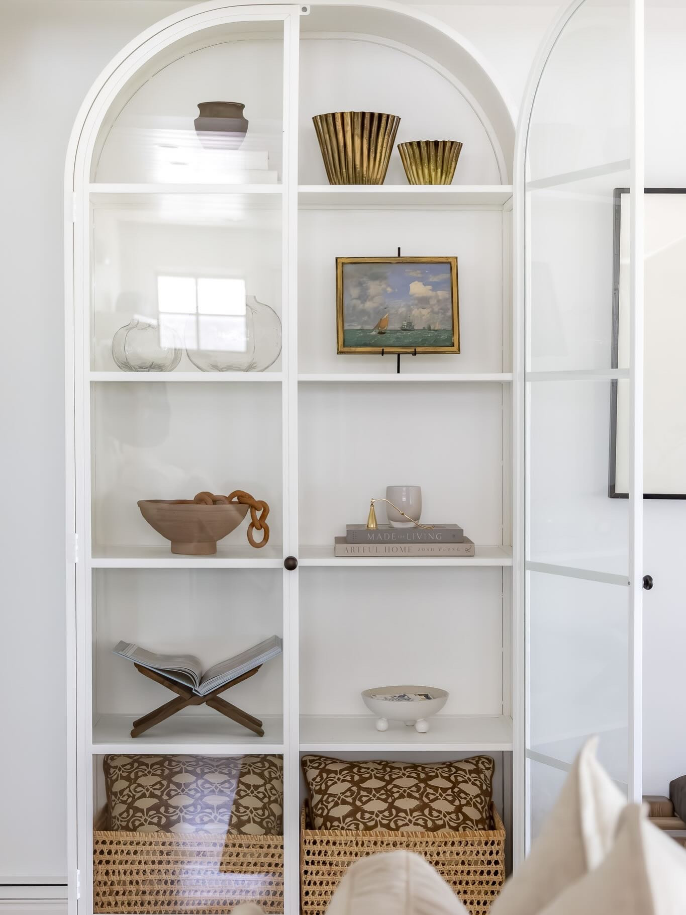 Few things bring us more joy than a well-styled shelf. It’s more of an art than a science, but we get asked often how to make a shelf look “just right” so here are our top 5 tips for styling. Save this for later so you have the recipe! 

1. Use a mix of things you already love and new things you buy with intent to just look pretty. Your decor will feel more like you if every piece isn’t straight from the Pottery Barn catalog. Bring out the personal art, family photos and vintage finds that you can display proudly. 

2. Varied heights are the key to your shelves not looking flat and boring. Think a tall vase next to a short canister, a big frame and a little frame overlapping, stacked boxes, using stands to lift art.

3. Books are your friend. Collect books from around your house and buy a handful of pretty coffee table books to act as a base for objects and add more dimension. Don’t tell your local librarian, but we always take the book jackets off to make them look simple and clean— plus you never know what’s hiding under a colorful jacket!

4. We love a good bowl. Wooden beads, terracotta or wooden chains and glass balls are our favorite fillers for bowls. The effortless look of a beaded garland spilling out of a bowl or off a box never gets old. Please— whatever you do— do not use fake grass balls, potpourri, or anything else you find labeled “filler” at Homegoods. Just walk away…

5. Have fun! The most important thing is that your home feels like a reflection of you so don’t force it. It shouldn’t look perfect or over styled. Less is more and personal is always better than store bought.

Design @pennyandpearldesign 
Photos @marinaporl