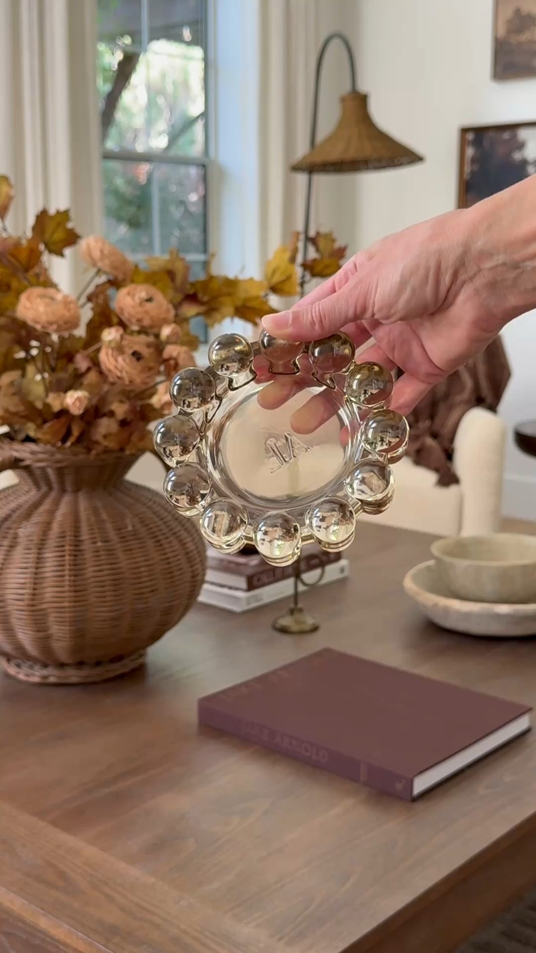 It’s all in the details!
A simple bubble dish, organic textures, brass candle holders, woven vase, and the most realistic fall stems — small touches that make a big difference.

Coffee table styling for fall. 

#LTKSeasonal #LTKStyleTip #LTKHome