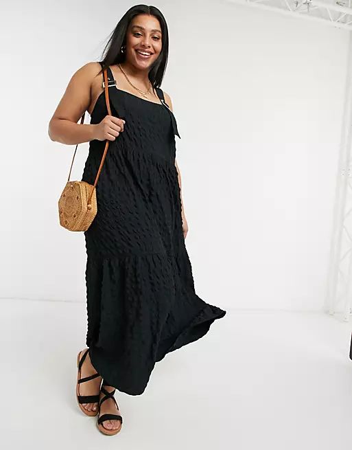 ASOS DESIGN Curve overalls-style midi sundress in bubble texture in black | ASOS (Global)