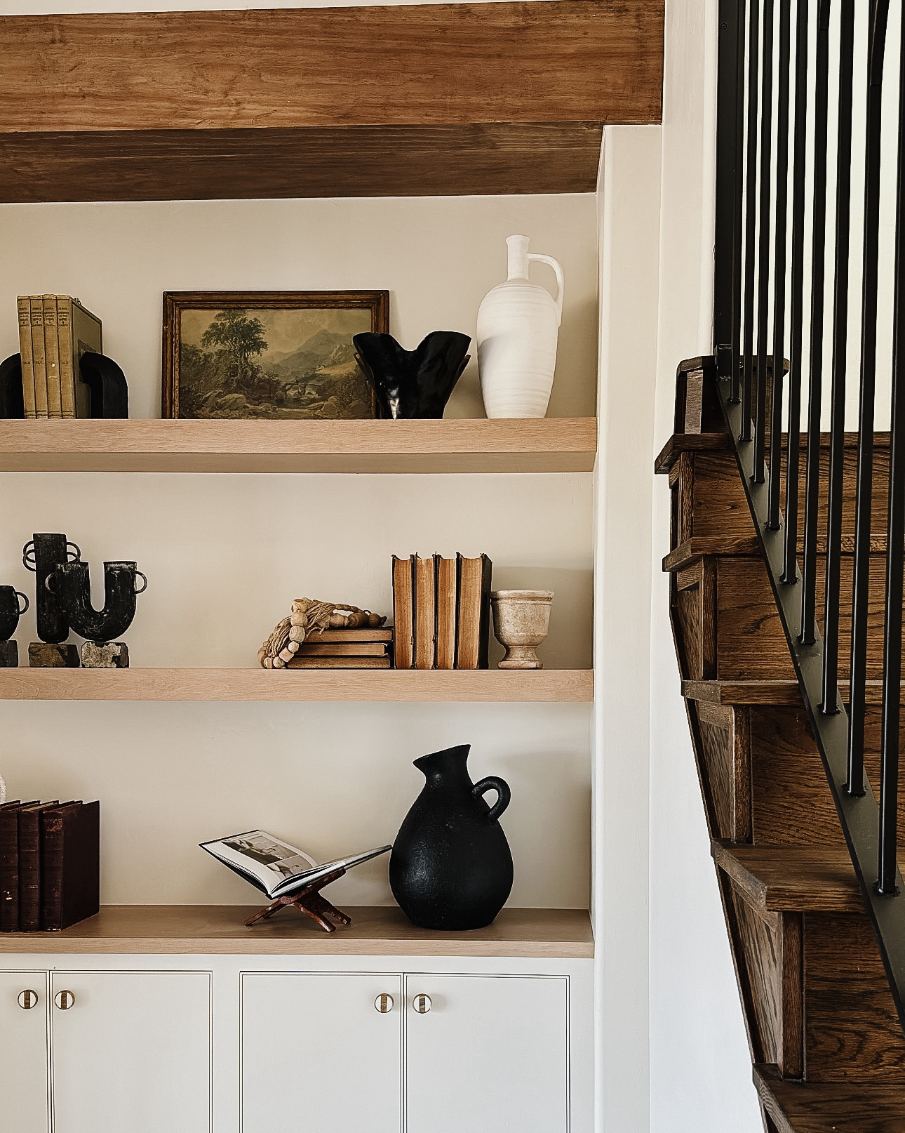Built-in Starter Kit 💅🏼 
A few tips I like to keep in mind while planning a design for built-ins:
1) start from scratch 
2) keep shelves symmetrical 
3) vary height and textures

#LTKhome #LTKstyletip