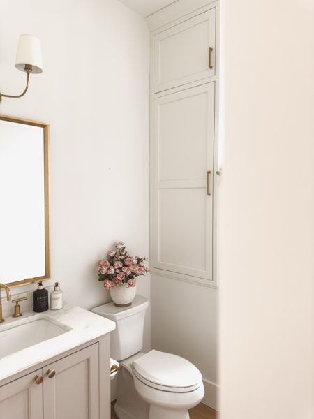 Light and bright spring powder room featuring creamy whites, gold detail, and faux florals. Love to keep a minimal style for this space to flow within the first floor

Spring style, powder room, neutral home, gold detail, creamy whites, home finds, faux florals, L’avant, gold hardware, lighting detail, Afloral, Wayfair, One King’s Lane, light and bright, aesthetic home, shop the look!

#LTKstyletip #LTKhome #LTKSeasonal