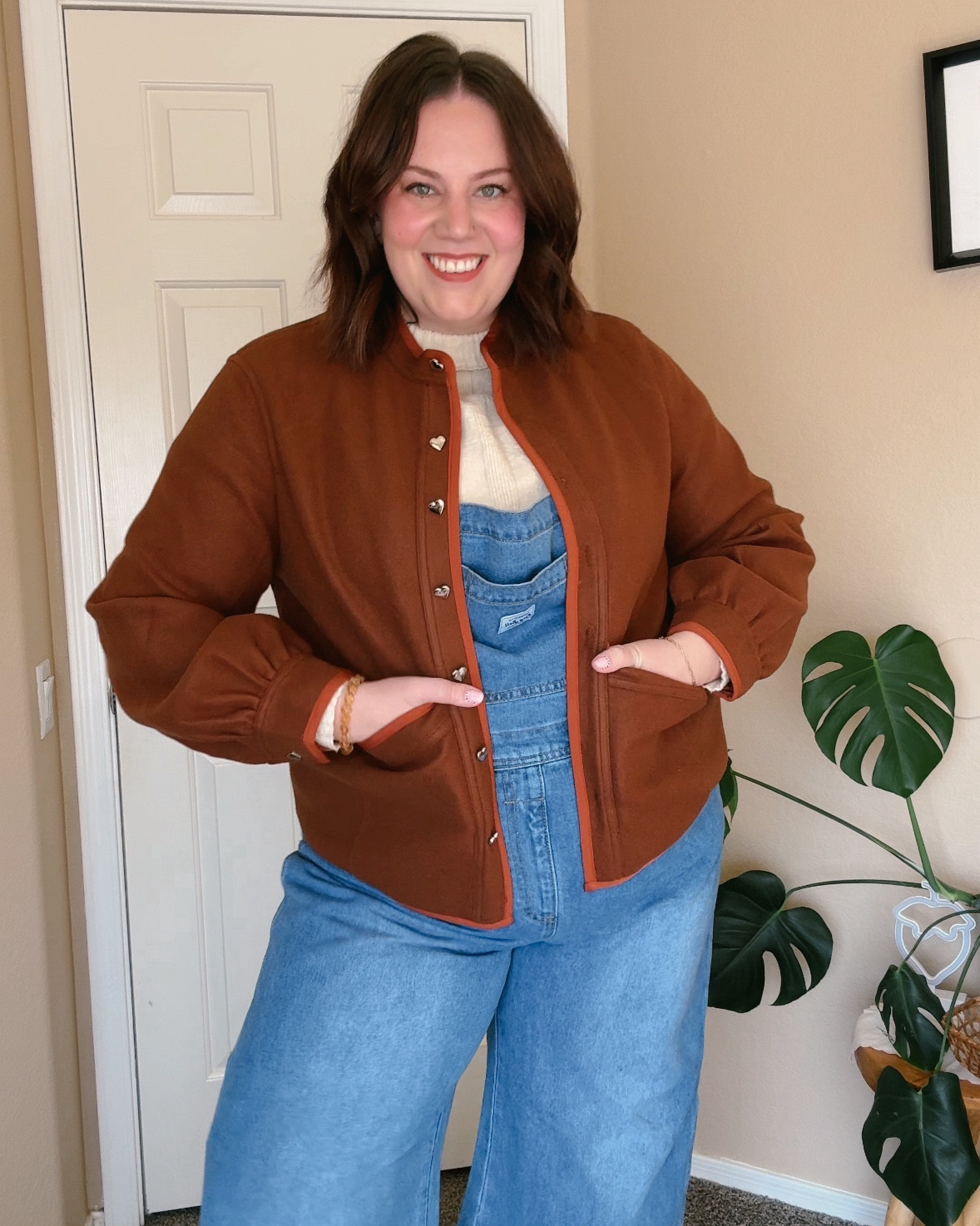 How freaking cute is this jacket!?! 😍 super cozy and affordable (which we loveee) look at the heart buttons!! 🤍🤍 

I’m wearing an XL (my regular size) but if you plan on wearing bulky sweaters under it I would size up!