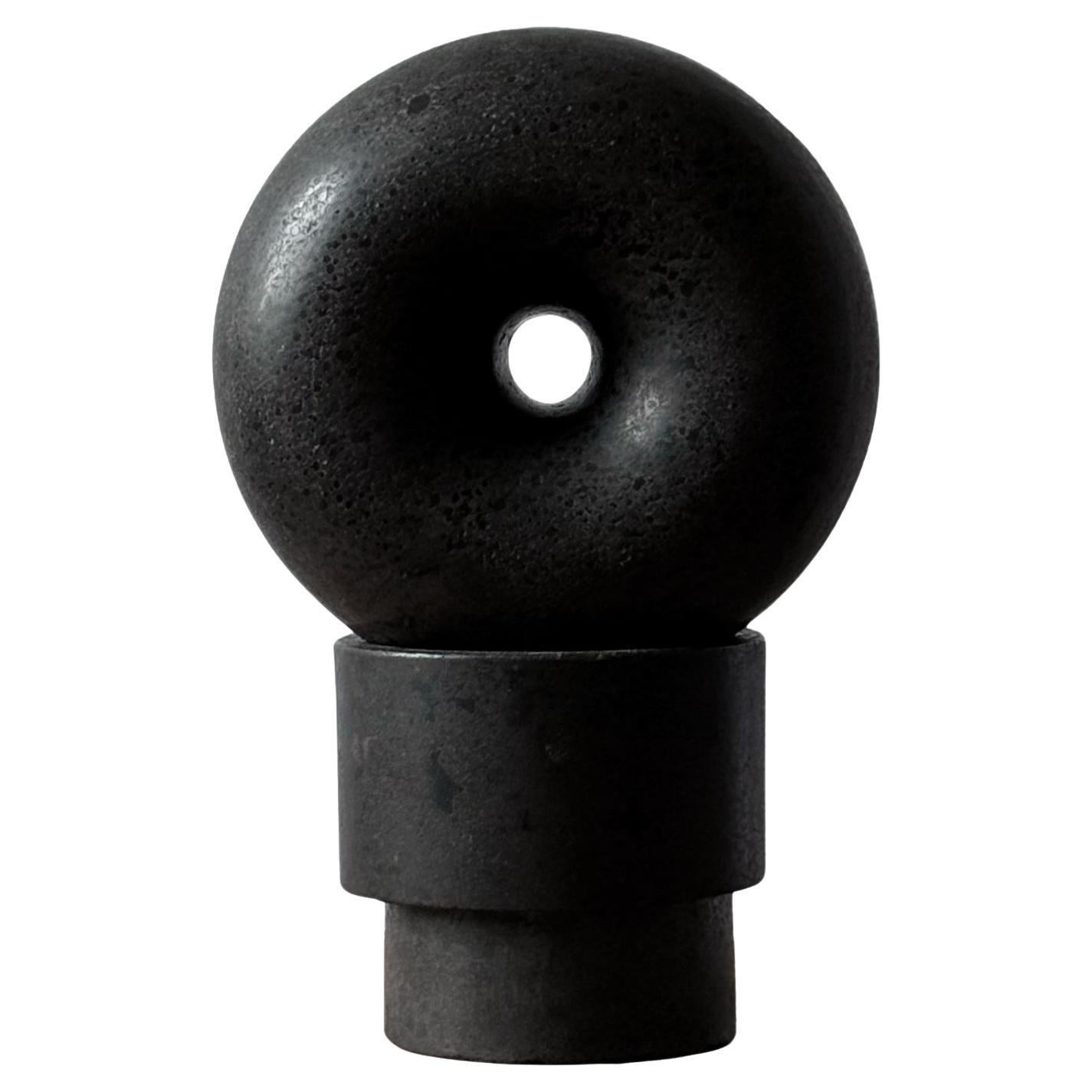 Rueda - Volcanic stone carved sculpture | 1stDibs