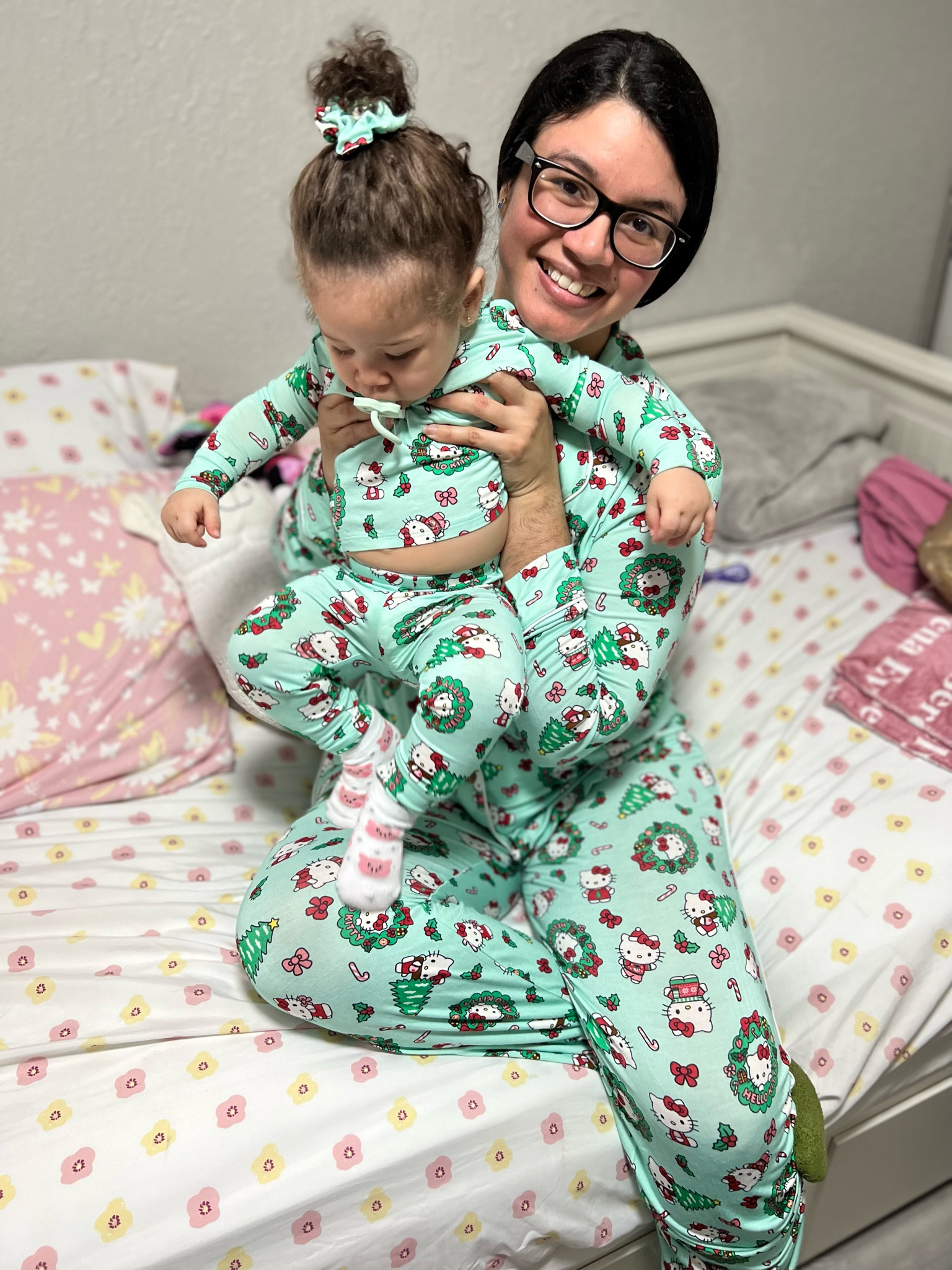 Matching hello kitty pajamas for mommy and baby! Mine are from Posh Peanut but i have linked similar below! 

Hello kitty pajamas // christmas pajamas