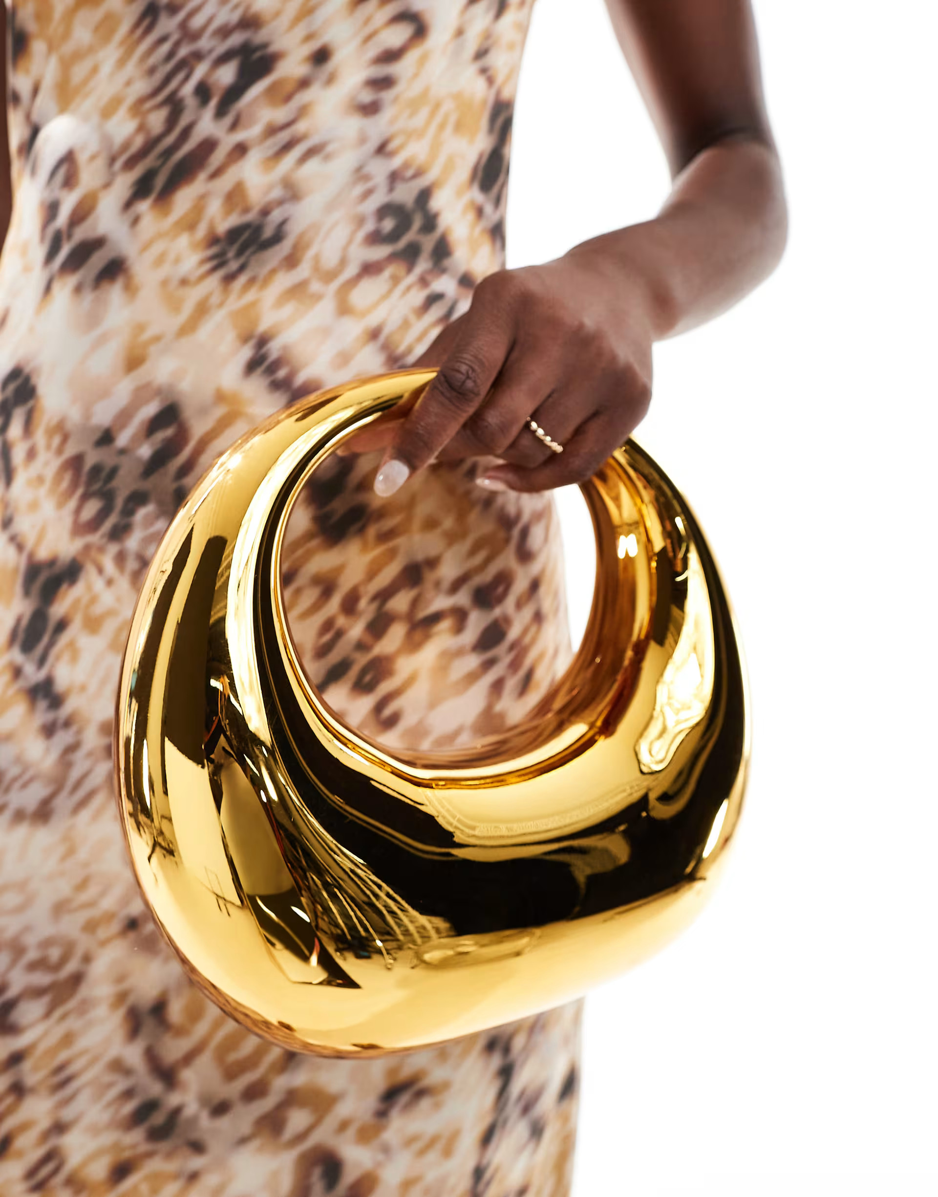 ASOS DESIGN hardcase scoop clutch in gold | ASOS (Global)