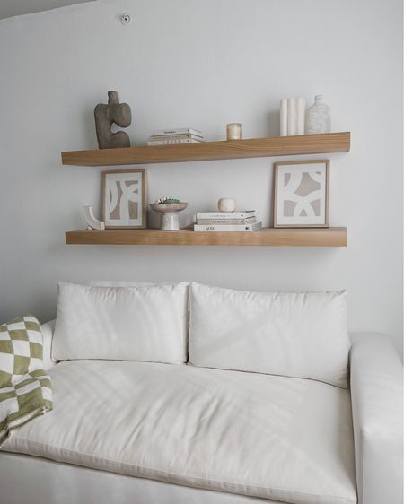 Styled Shelfie ✨✨ Shelves are custom made, everything else is linked on my amazon storefront! 

Shelf decor, floating shelves, white couch, white sofa

#LTKSeasonal #LTKstyletip #LTKhome