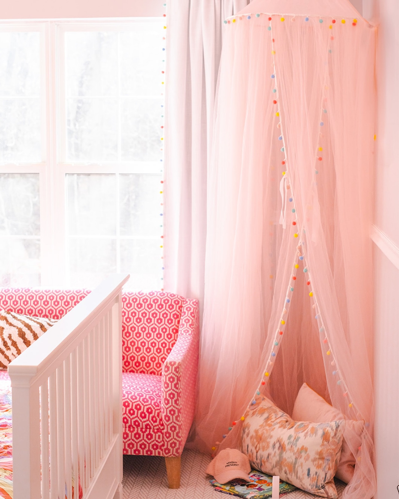 A reading corner perfect for a little girl to relax and have some “me” time at the end of the day 💖 with semi custom canopy by @wendywojo70 

Photography by @lifeinthemagichour 

#grandmillennial #grandmillennialdecor #maximalism #maximalistinteriors #njinteriordesign #interiordesign #girlsroominspo