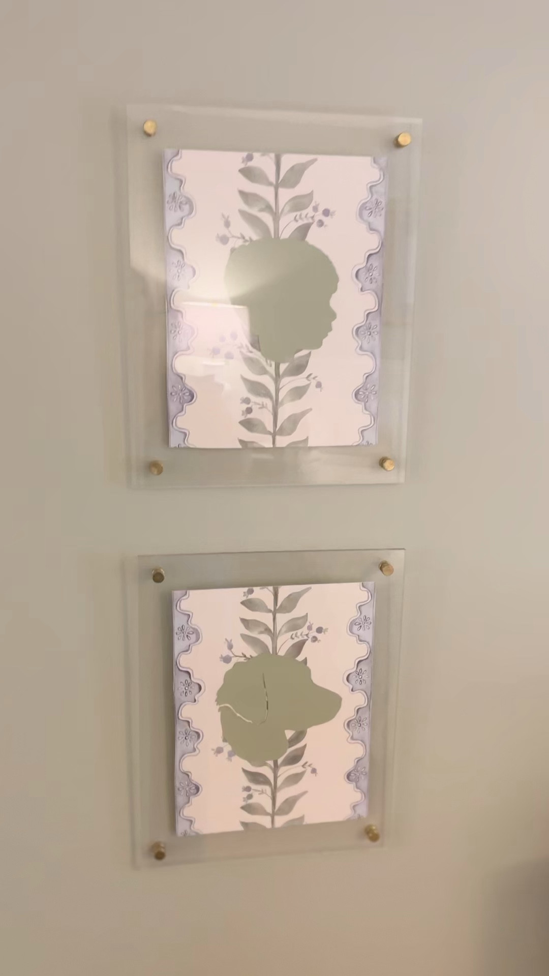I made these silhouettes using thrifted Target frames and Spoonflower peel and stick wallpaper with a Cricut. You could also have a local business with a cricut or Etsy make the silhouette shape! One sample of the wallpaper was enough for this project.

#LTKhome