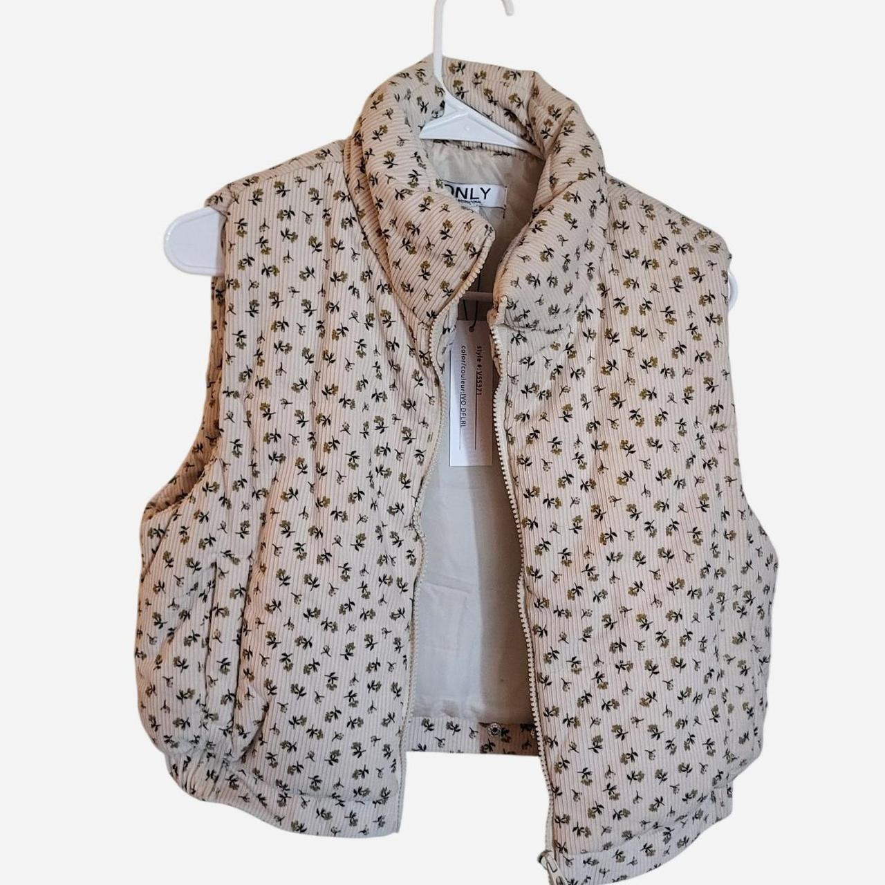 Cream floral corduroy puffy vest
ONLY by 26... | Depop | Depop US