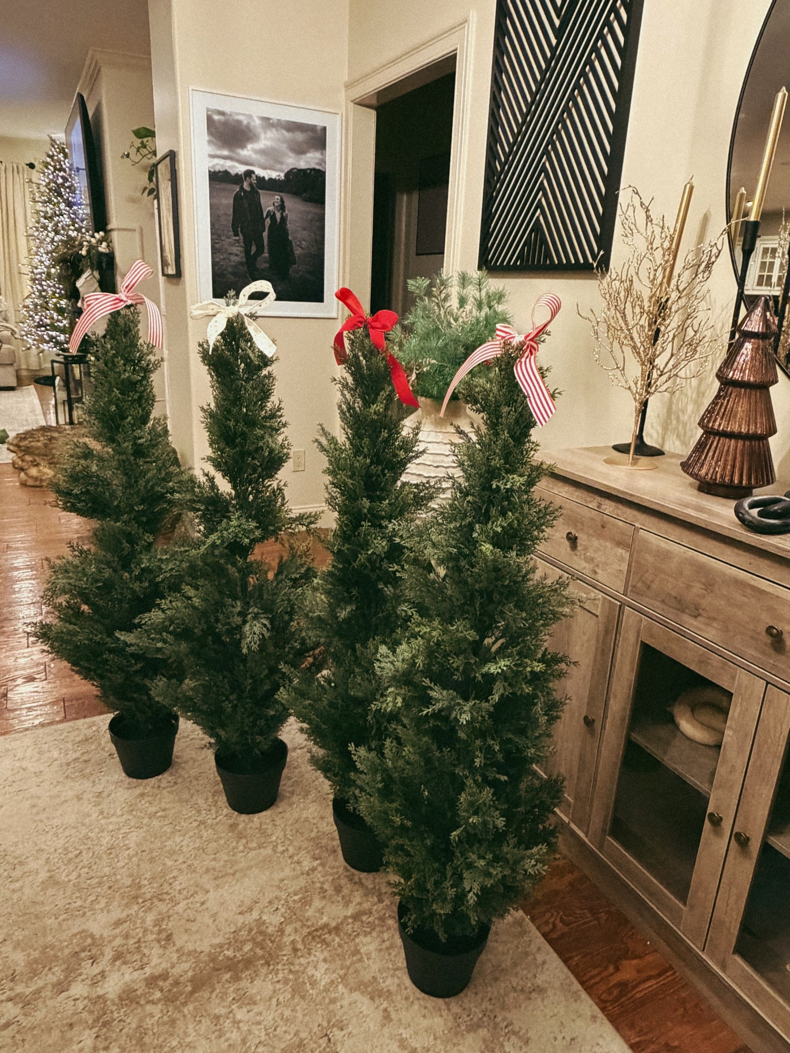 Found the CUTEST fake trees for the front porch! I tied some ribbon on them, but they look so real! 

#LTKSeasonal #LTKHome #LTKHoliday