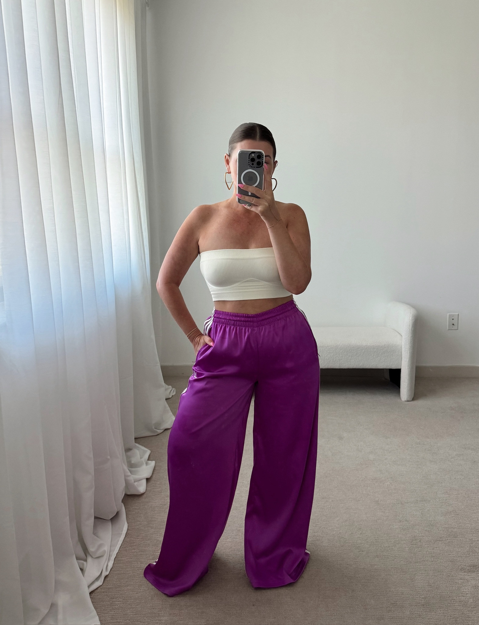 Adidas satin wide leg track pants fit tts (sizes are oddly stocked, get a size up or down if your size is missing)

I’m an 8 and went with a size up. They’re SUPER long. I wore 4” heels here and they still dragged the ground.

I love them so much I’m going to have them hemmed to fit 

#LTKStyleTip #LTKFindsUnder100