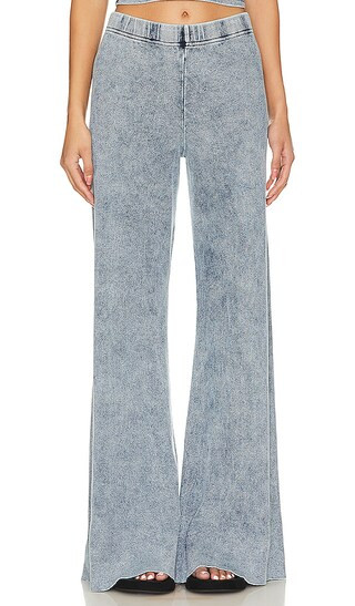 Ommin Rib Flared Pant in Faded Denim | Revolve Clothing (Global)