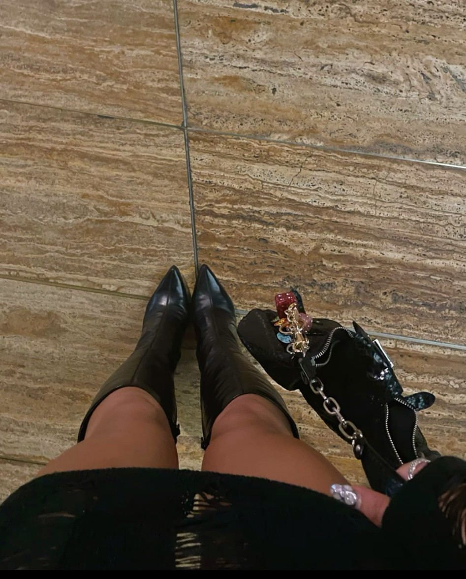 All black going out outfit. Long sleeve dress, black leather boot heels, black leather bag, with a half up half down curly hairstyle and simple jewelry. 
▪️Vintage Nine West black leather heels. 
▪️Bag is also thrifted leather bag. 
▪️Charm is from Coach, 2 sparkly dice that add the cutest touch to any night out fit. 
▪️Dress is Jaded London Black Knit Long Sleeve Ripped Dress with an open back. 


#LTKBeauty #LTKStyleTip #LTKSeasonal