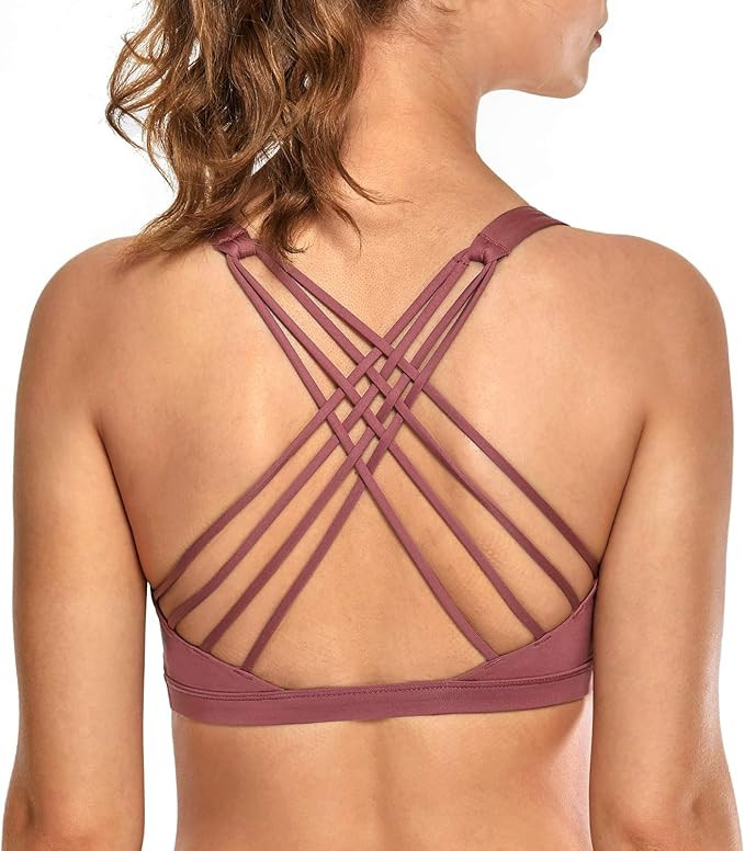 CRZ YOGA Strappy Sports Bras for Women Cross Back Sexy Padded Yoga Bra Tops Cute Activewear | Amazon (US)
