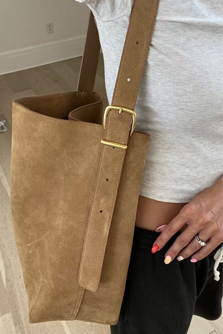 My new suede bucket tote looks designer and is under $200 🤍

Madewell, suede bag, bucket bag, suede tote, mom bag, travel bag, John galt sweats, travel outfit, casual outfit, summer outfit, mom outfit, Christine Andrew 

#LTKTravel #LTKStyleTip #LTKItBag