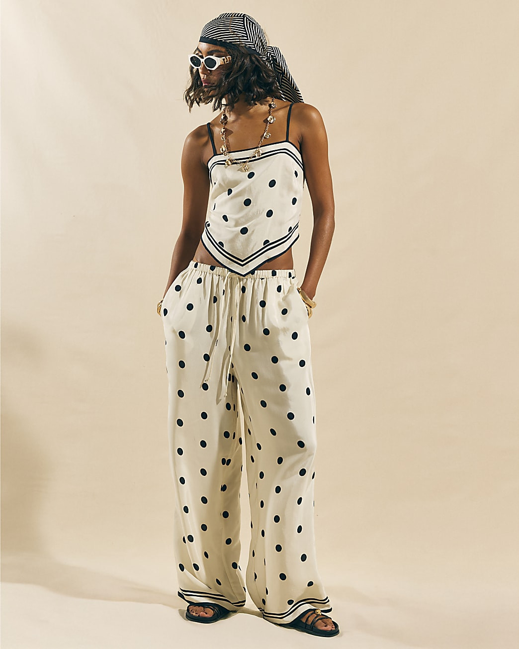 Cream Spot Print Wide Leg Trousers | River Island UK & IE