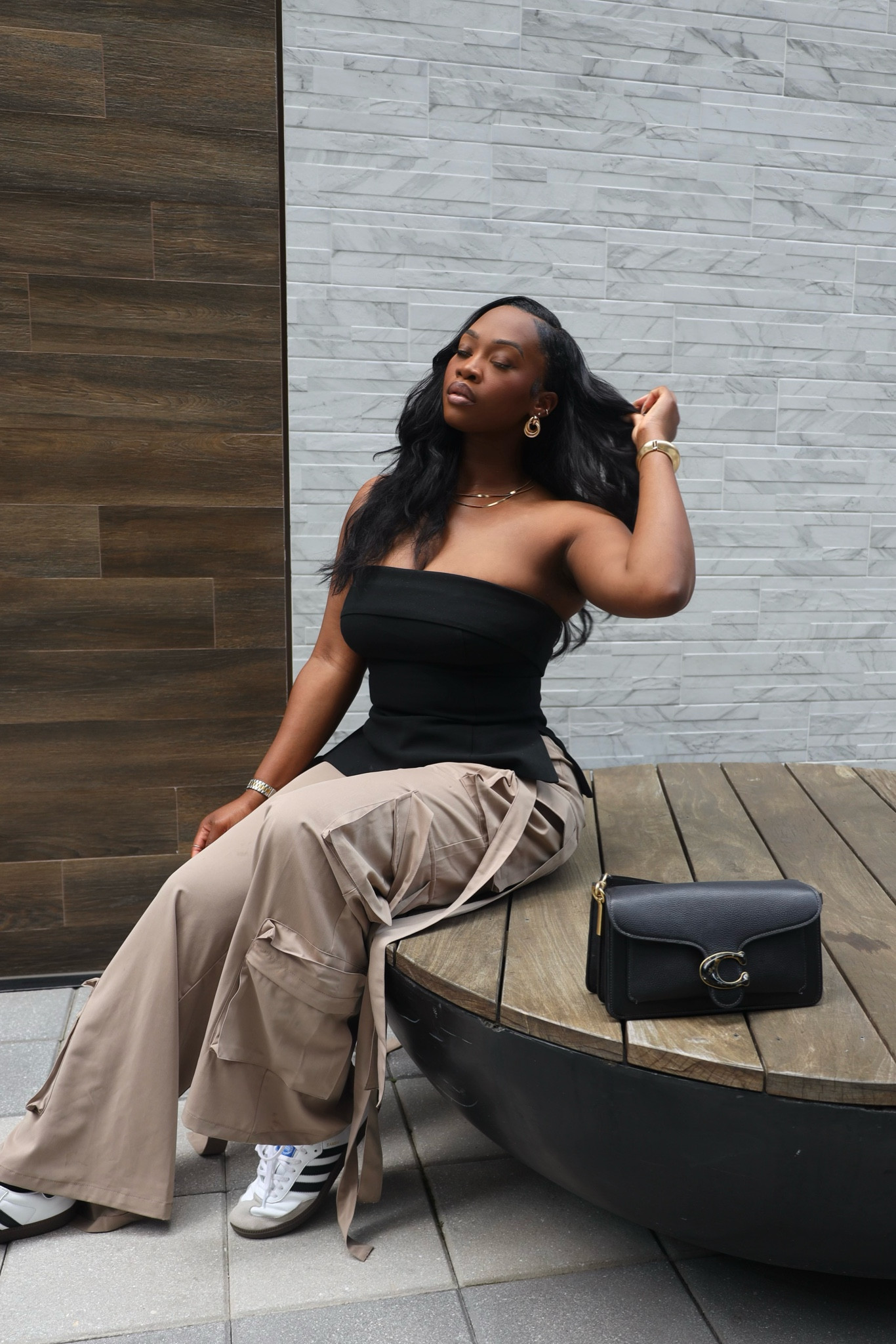 Elevated casual type day 🖤 pairing  more casual cargos and sneakers with a structured tube top brought this fit up a notch! 

#LTKStyleTip