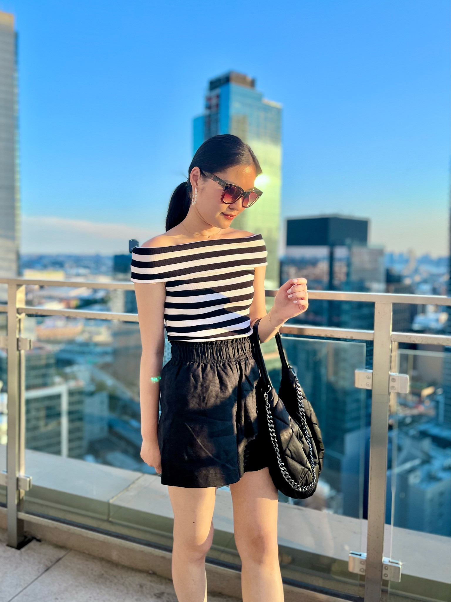 Black and white summer outfit featuring striped off the shoulder, fitted tee and black linen shorts with a paper bag elastic waist band (XS). 

#LTKSeasonal #LTKFindsUnder50 #LTKStyleTip