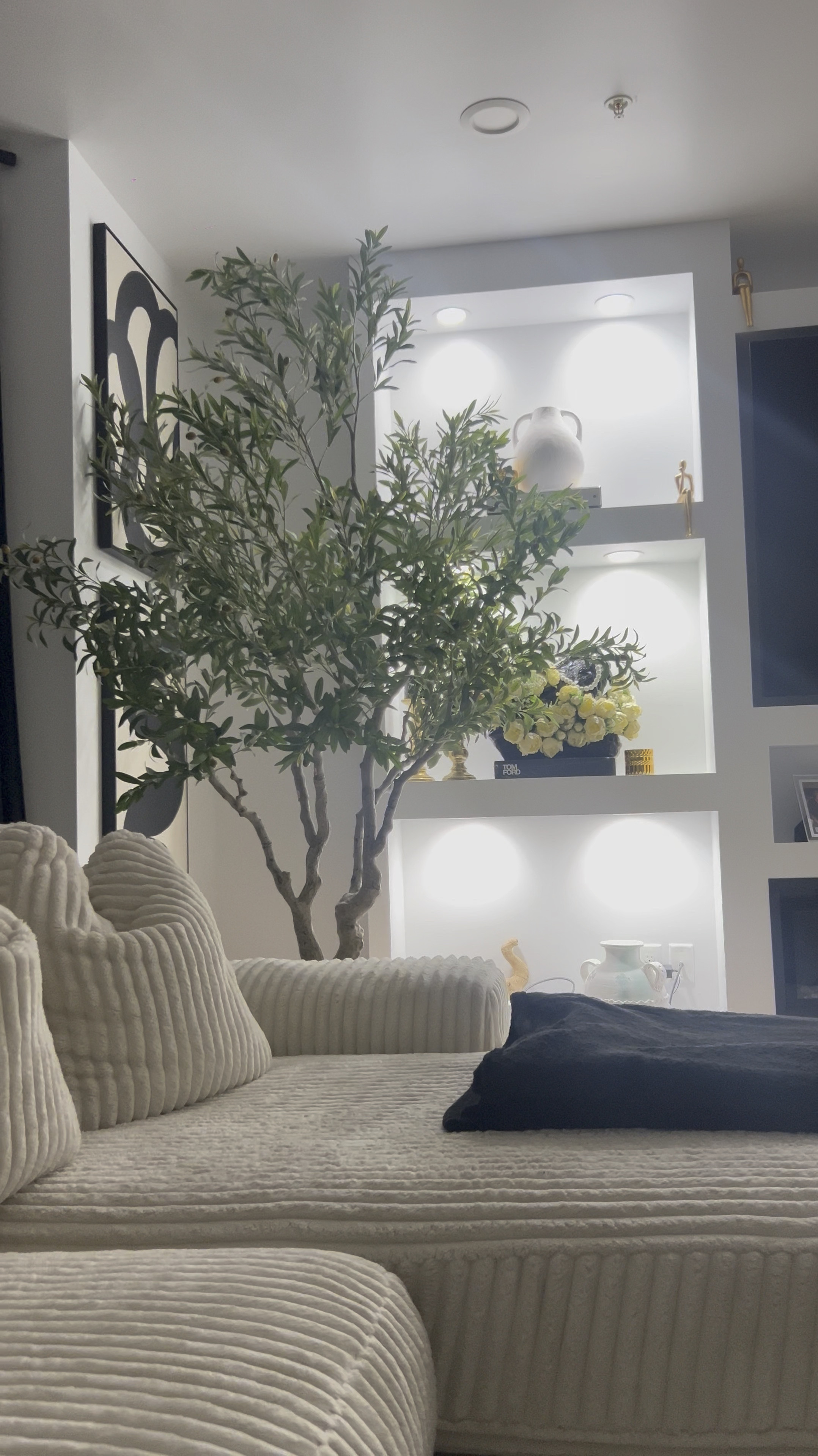 Soft life sanctuary. Romanticizing my home, one piece at a time. 

Do you like the tree in this corner? 🌳🌳

#fauxolivetree #costcofinds #modernhomedecor #luxeaesthetics #livingroomdesign #livingroommakeover #luxuryhomedecor #costcodeals #costcolife #moderncontemporary #interiørdesigner

#LTKfindsunder100 #LTKhome #LTKSeasonal