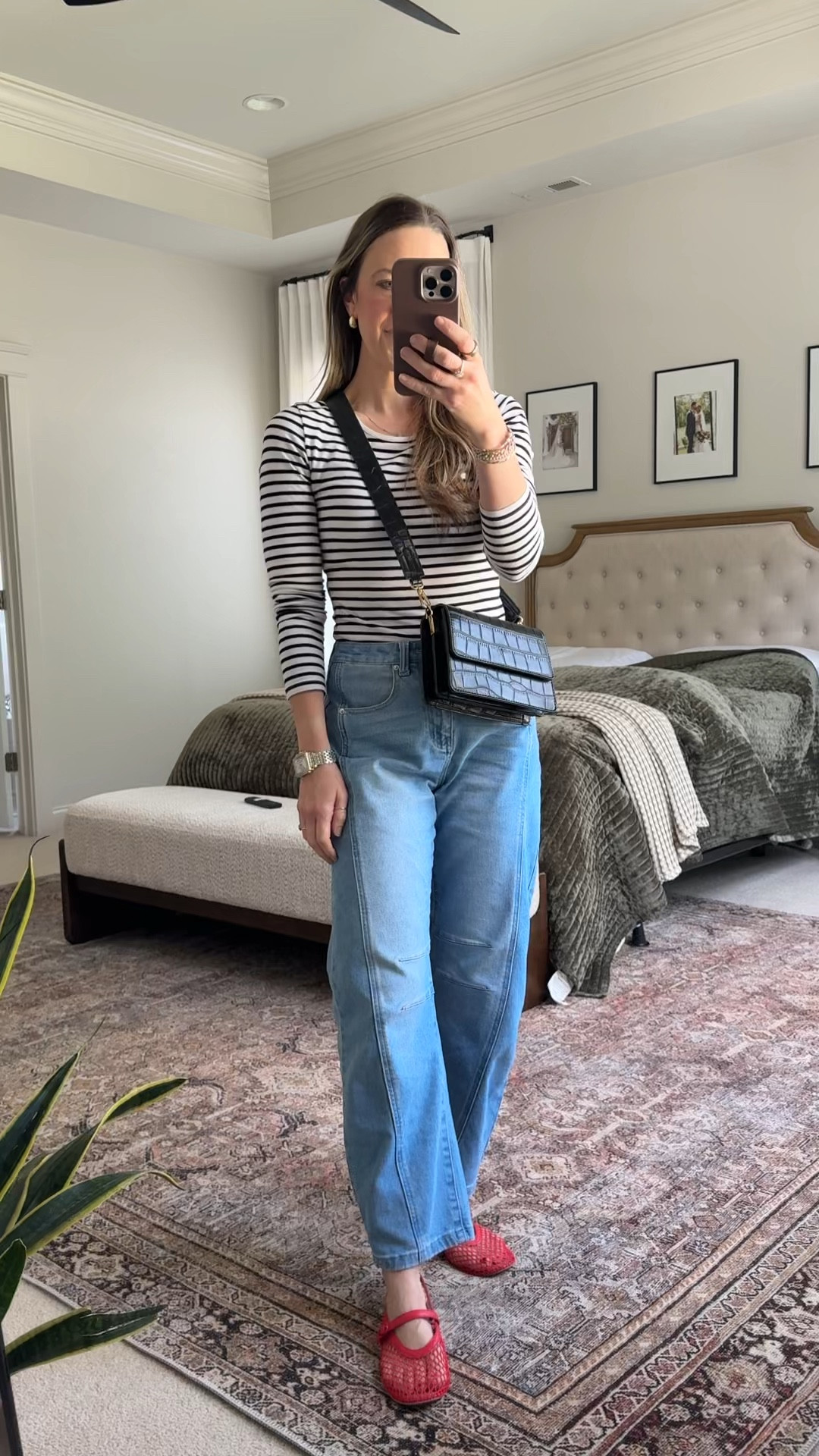 Classic Striped Tee + Amazon Jeans Outfit ❤️

• Black & white striped long sleeve
• Amazon high rise straight leg jeans
• Red Mary Jane flats
• Amazon black crossbody bag

This is one of my favorite easy outfit formulas: striped top + straight leg jeans + statement flats.

The striped long sleeve tee keeps it timeless. The red flats add personality. The structured crossbody instantly elevates the whole look.

Perfect for:
• Casual chic mom outfits
• Straight leg jeans outfit
• Amazon jeans find
• Spring outfit ideas for moms
• Classic French-inspired style
• Everyday capsule wardrobe
• School drop-off outfit

These Amazon jeans are such a good budget-friendly option if you love the high-rise, barrel fit.



#LTKmomlife #LTKootd