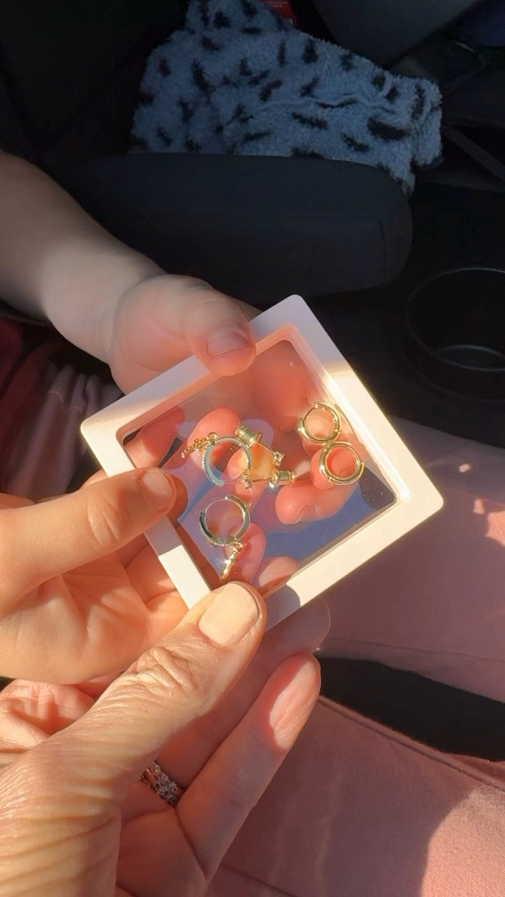 Set of 3 earrings less than $16. I told Harlow that the tiny cross hoops are similar to what Taylor Swift wears, and she asked me if Taylor loves Jesus. 🥰 #amazonjewely #hoopcrossearrings 

#LTKkids #LTKfindsunder50 #LTKVideo