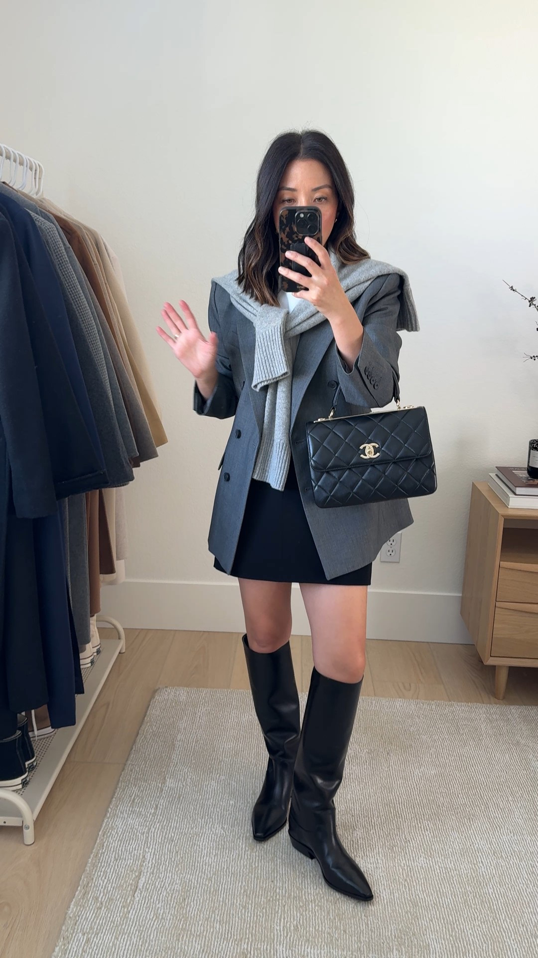 How to style knee-high boots for fall 2025. Knee-high boot outfit ideas. These are new from Reformation and I love the simplicity of them. Pull on style, no extra fluff. Fit my 5ft, short legs. 

Aritzia blazer 4
Aritzia tee medium
Theory skirt 0, runs big
Reformation boots 5.5
Chanel Trendy cc small
Everlane sweater xs
YSL Sunglasses

#LTKSeasonal #LTKStyleTip #LTKPetite