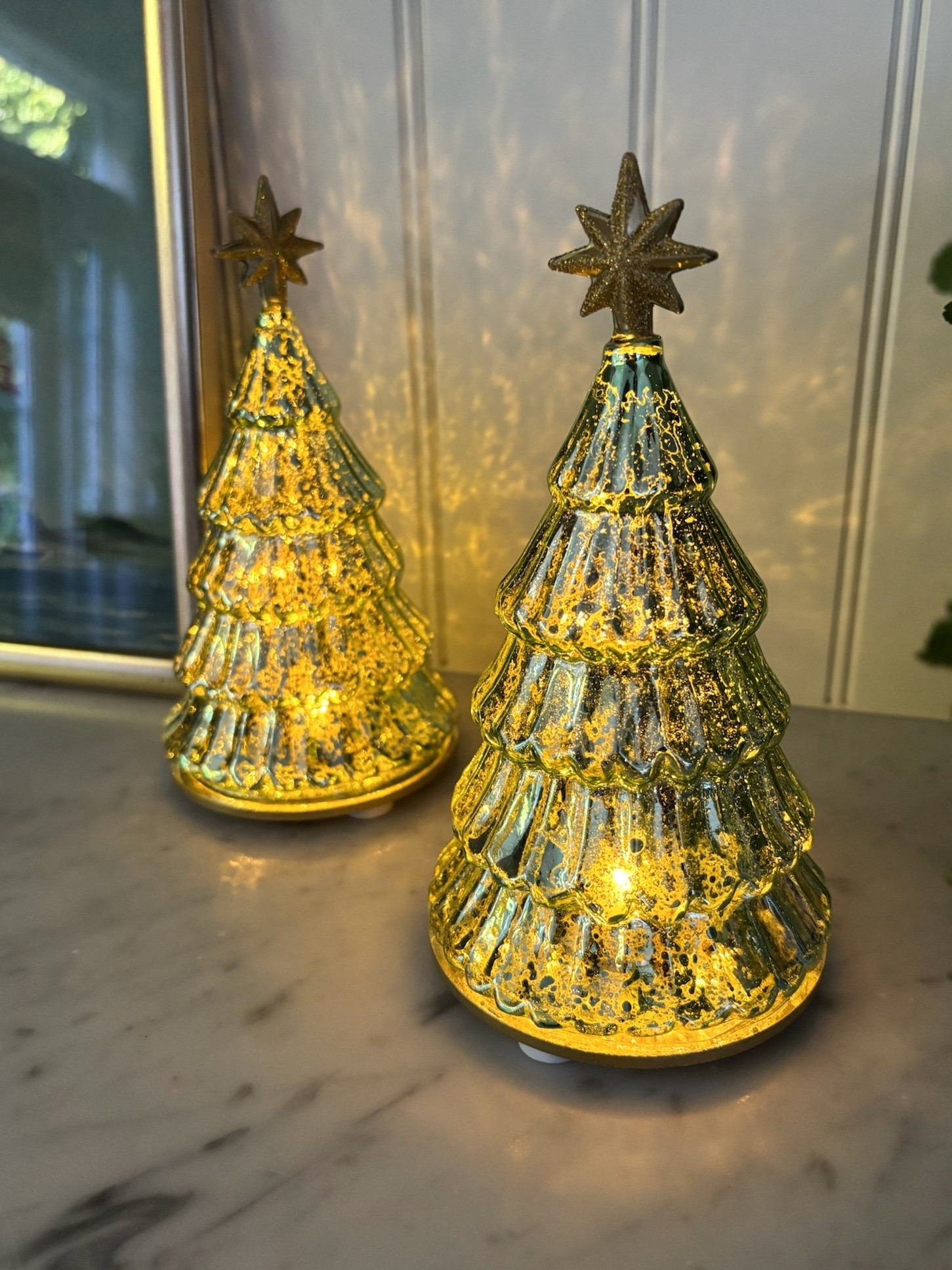 These lit mercury glass trees are stunning! (Battery powered). 

#LTKHome #LTKHoliday #LTKSaleAlert