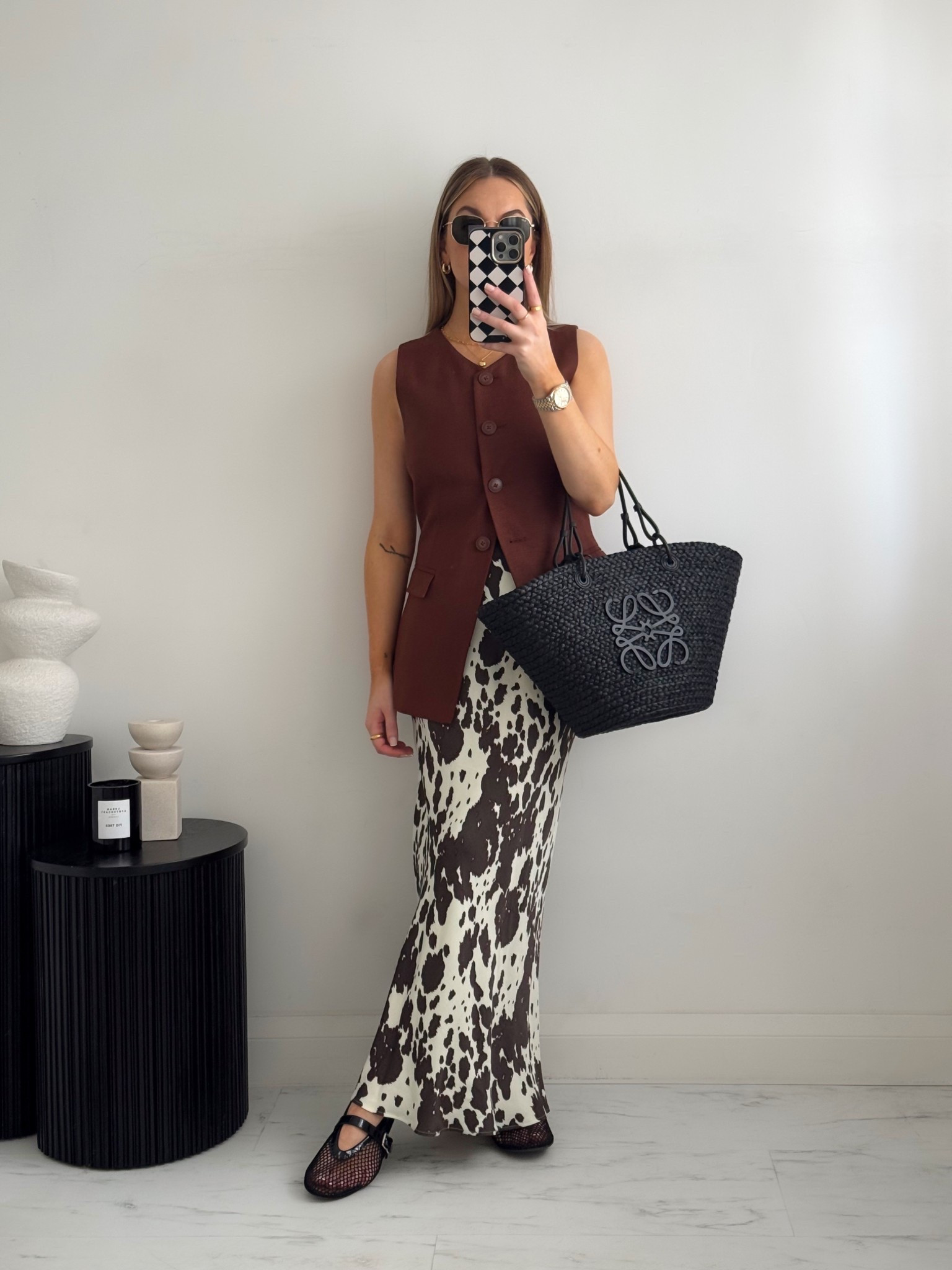 Summer / holiday outfit with a cow print skirt 

#LTKFashionMonth #LTKstyletip #LTKspring