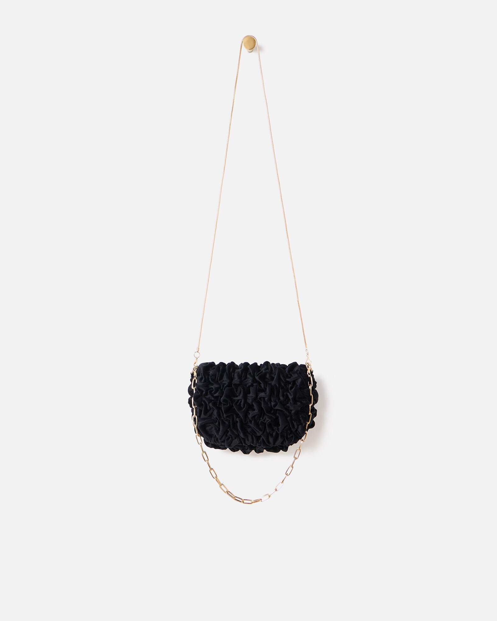 Avie Black Velvet Ruched Clutch Bag | Oliver Bonas | Oliver Bonas (Global)