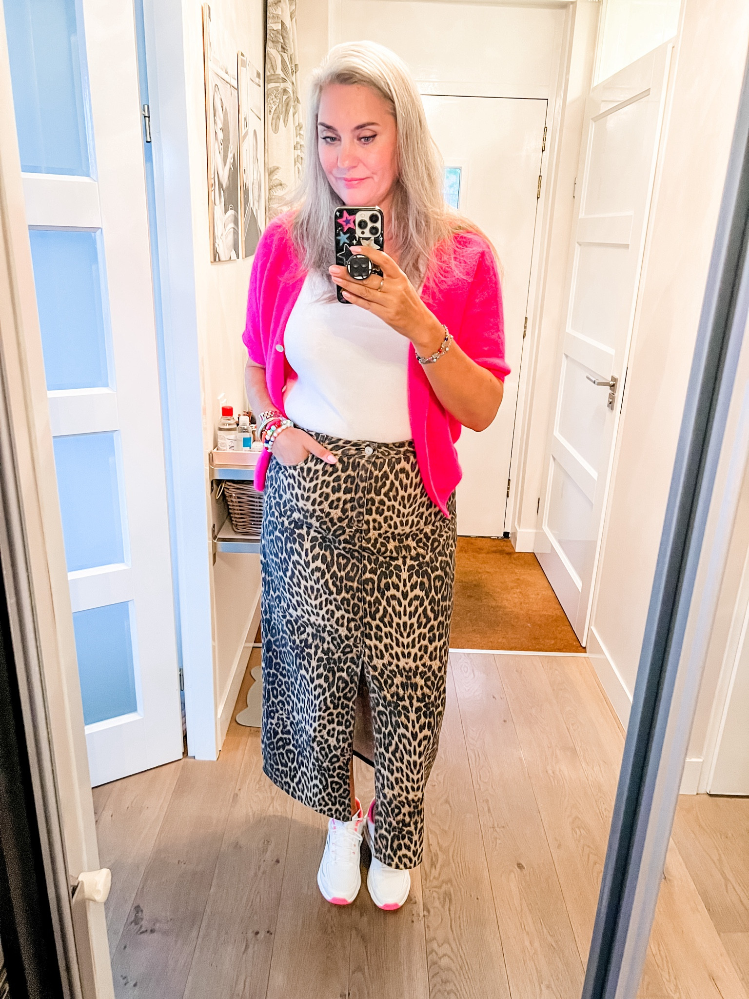 Ootd - Monday. Short sleeve hot pink cardigan (local boutique), white tank top, denim leopard skirt (Neo Noir) and chunky Skechers sneakers. 



#LTKeurope #LTKmidsize #LTKstyletip