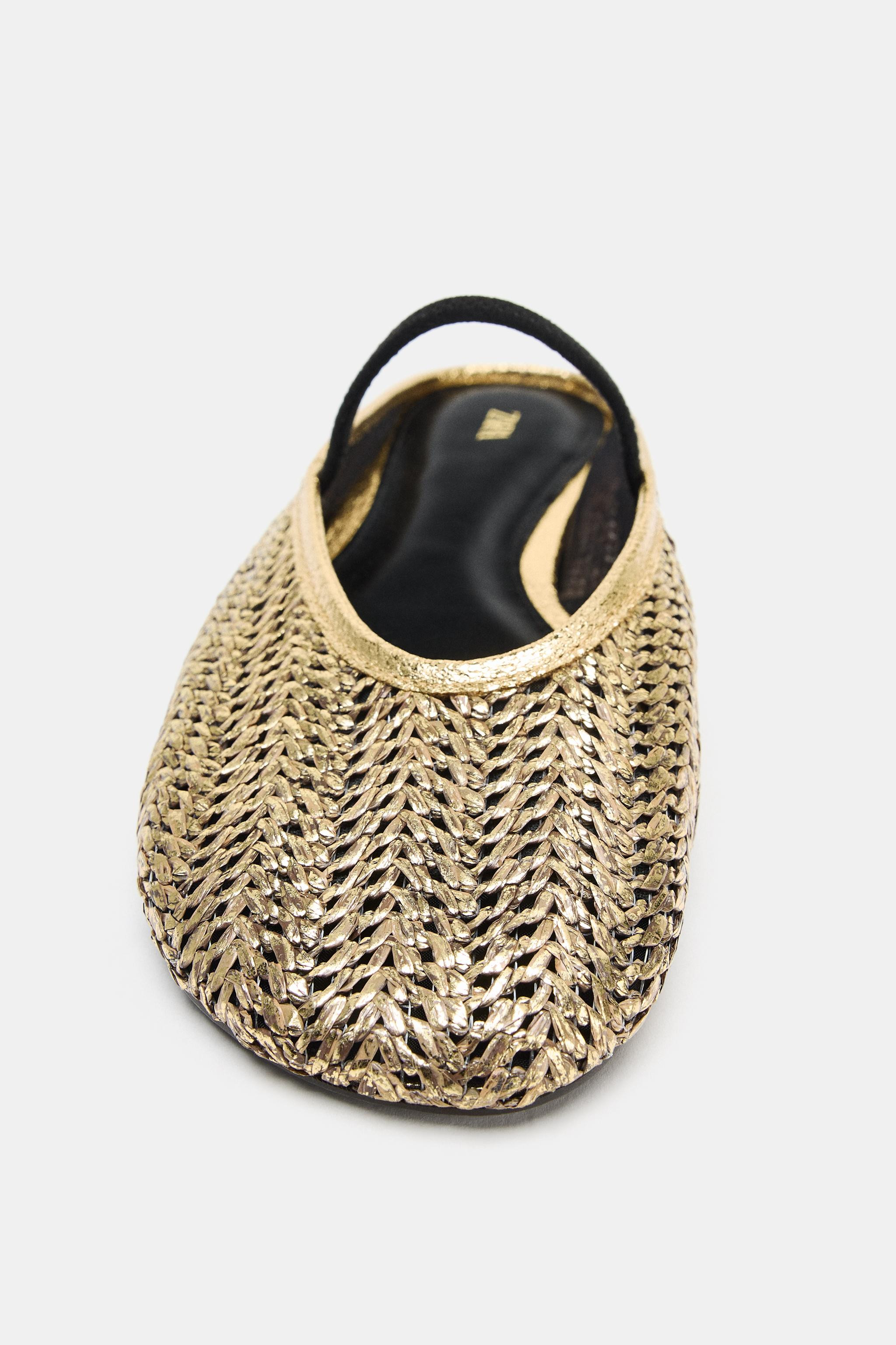 Model height: 179 cmFlat mule shoes with a metallic effect. Woven upper. Elastic strap on the ins... | Zara UK