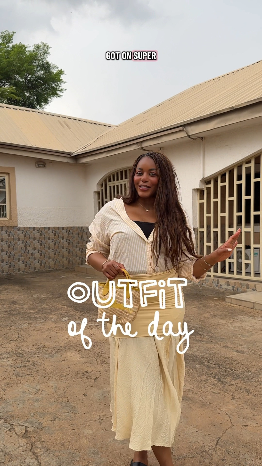 Day 2 in Abuja, Nigeria and this is what I am wearing. Love this cute butter yellow outfit for the spring and summer! Wearing a striped button up shirt, line by k midi skirt, black sandals, longchamp handbag .. 

For more links to spring outfits 2026, easter dress women, easter outfits women, date night outfits, vacation outfits beach, spring dresses, easter basket ideas, work outfits, country concert outfits, follow me on LTK! ✨

#LTKdayinmylife #LTKootd #LTKgrwm