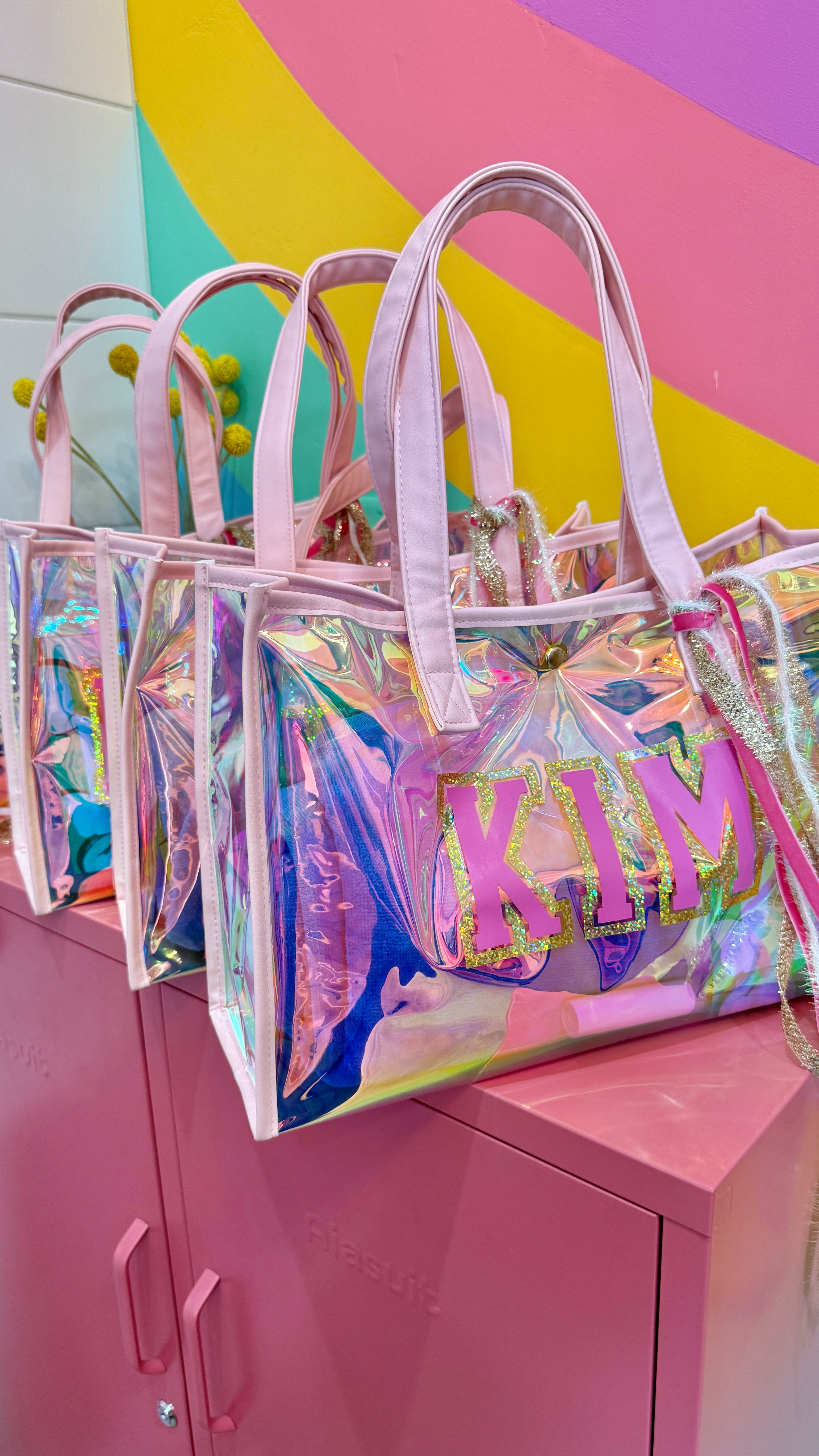 I find the most adorable holographic tote bags at Walmart from the Paris Hilton line. I whipped up some monograms on my Cricut and made gifts for all of my friends for my birthday trip! This tote comes in two different colors. This would make for a great Mother’s Day gift idea!

#LTKTravel #LTKGiftGuide #LTKSeasonal