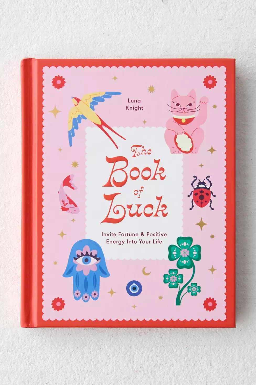 The Book Of Luck: Invite Fortune And Positive Energy Into Your Life By Luna Knight | Urban Outfitters (US and RoW)