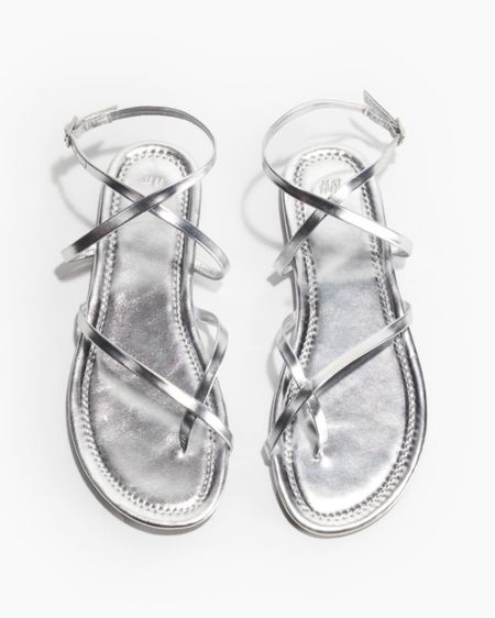 Strappy silver sandals 

#LTKstyletip #LTKSeasonal #LTKfindsunder50