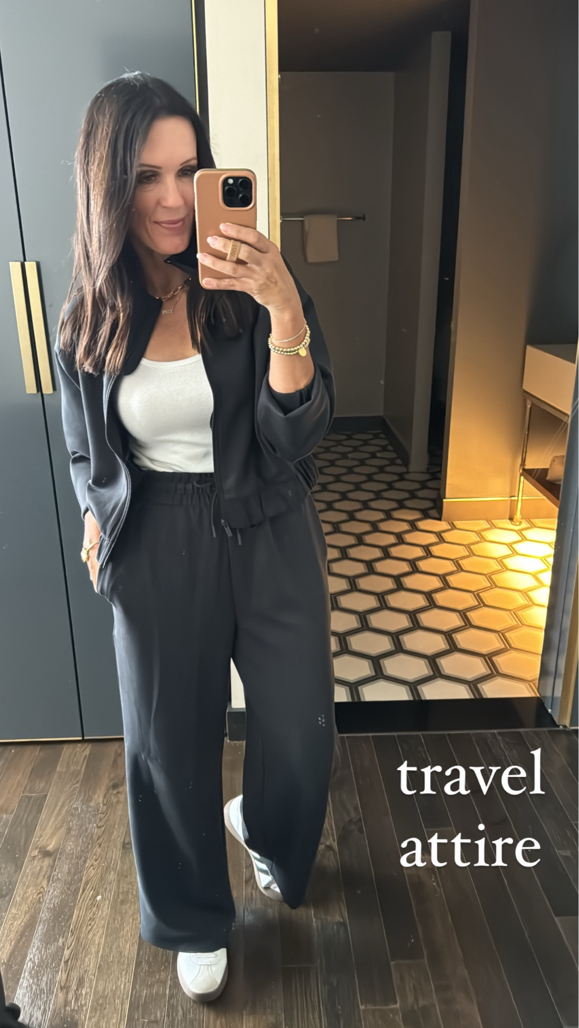 Casual travel outfit, a total look for less that is SO comfy! Grab it while you can! Linked my roomie, Nanette’s set, too!

Sizing:
Jacket and bottoms-wearing medium 
Tank-small
Adidas-tts

casual outfit | cozy outfit | fall outfit | travel outfit | Target style 

#LTKFindsUnder50 #LTKStyleTip #LTKOver40