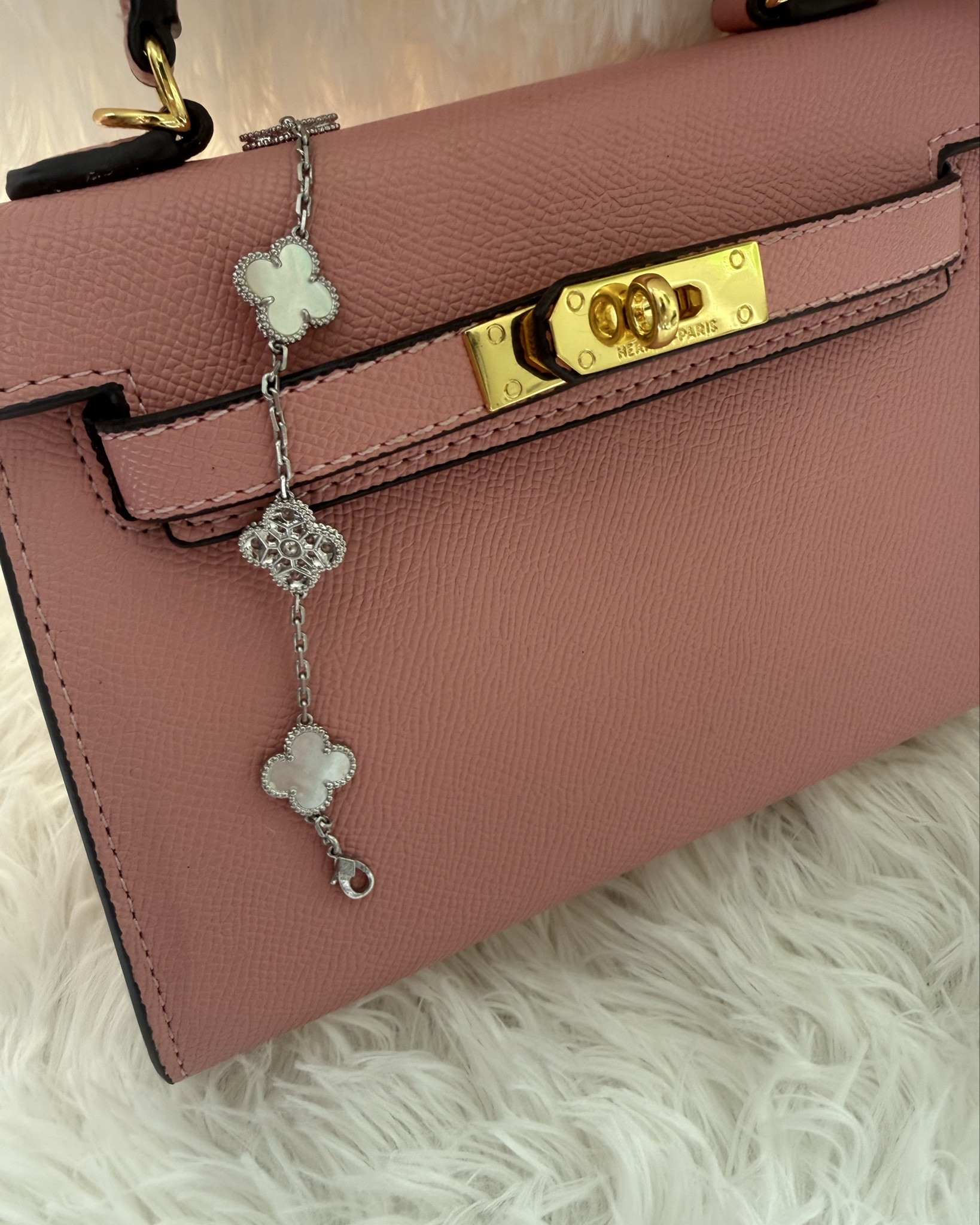 Hermes’ Kelly mini 20 in bubble gum pink and VCC clover bracket 

#LTKbeauty #LTKbag #LTKstyletip